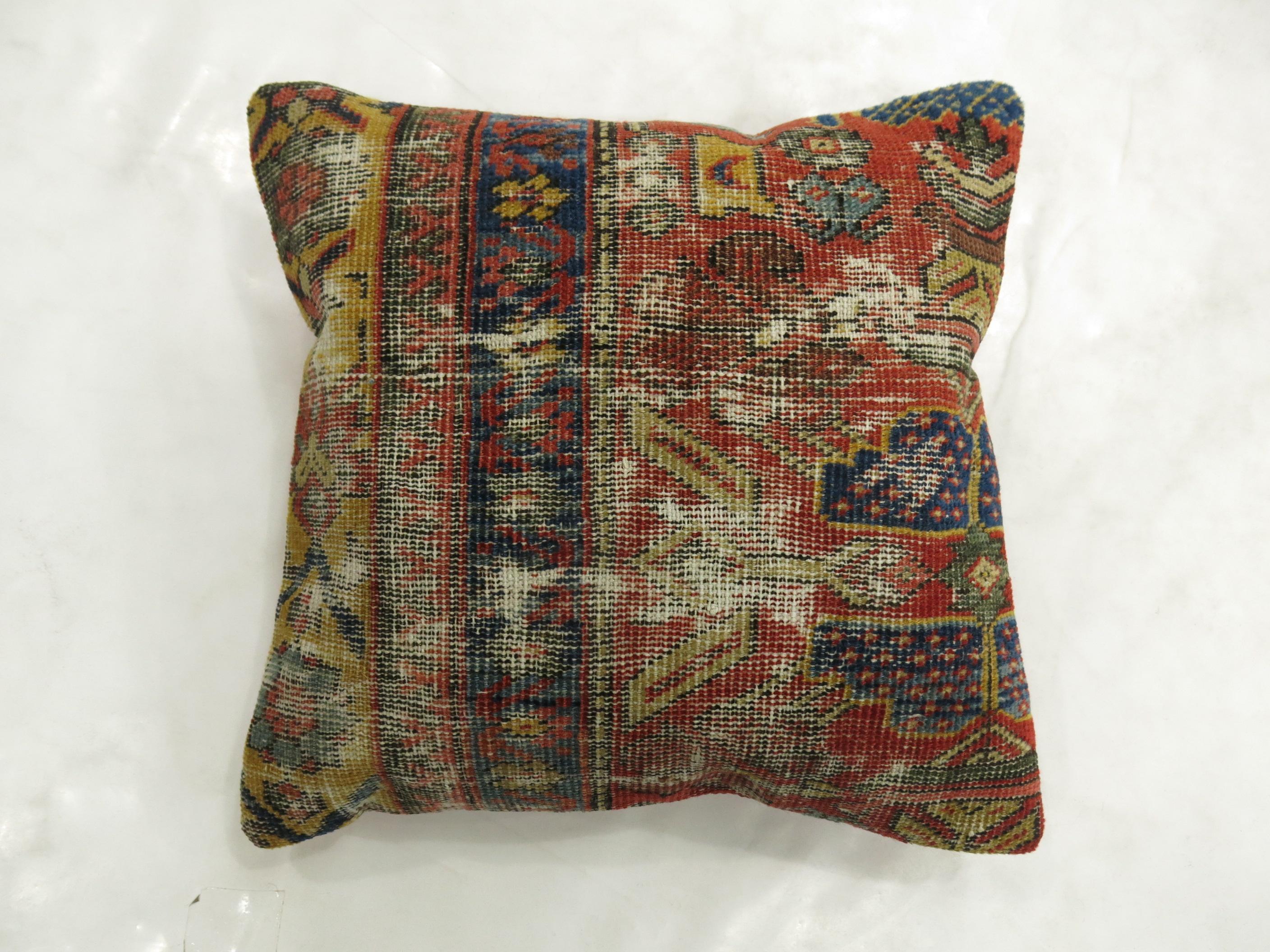 Pillow made from a 19th-century Persian rug. 16'' square.