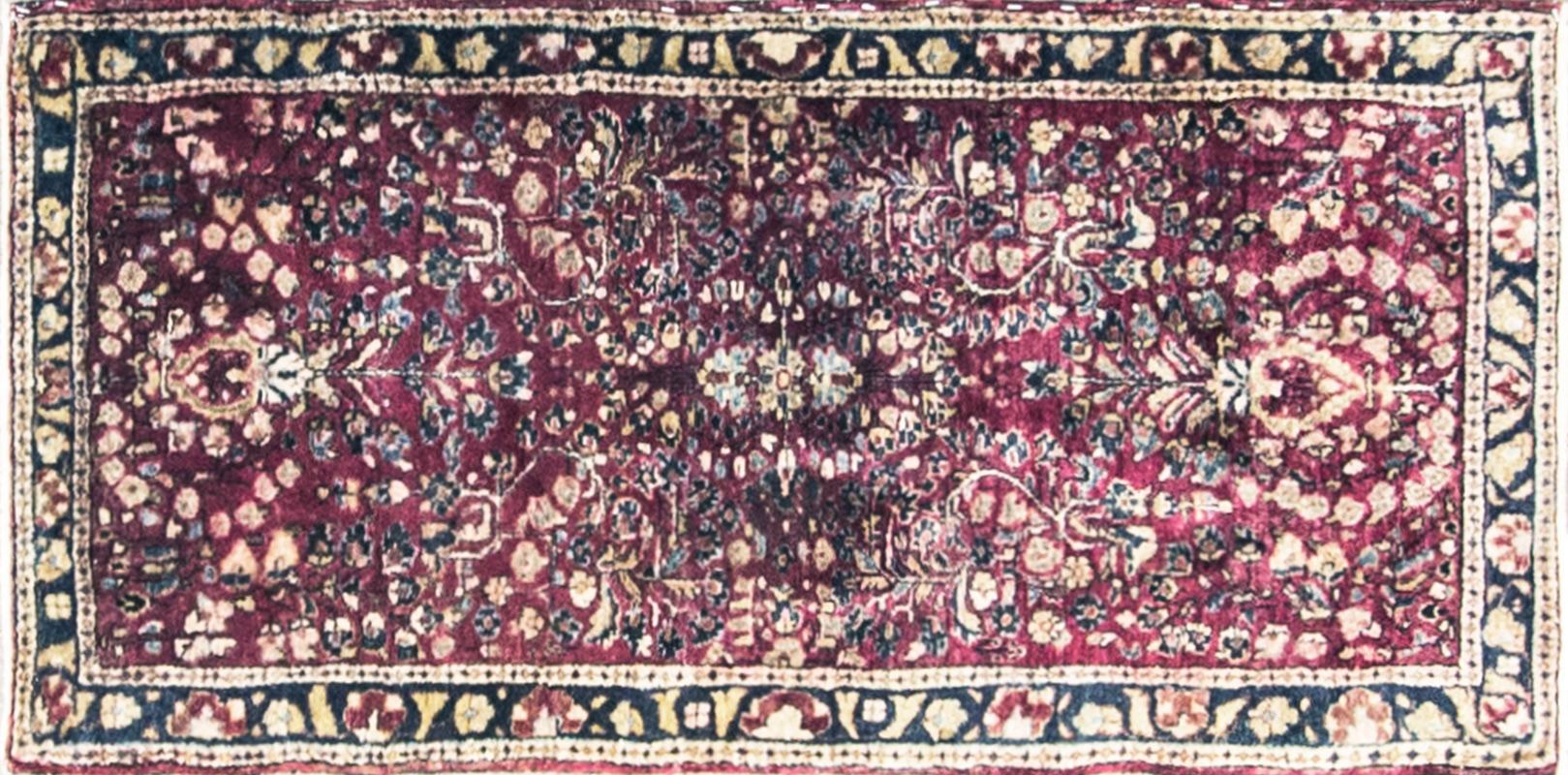 Persian Sarouk rug with allover motif on a red field in excellent condition. Measures: 2' x 4'1
