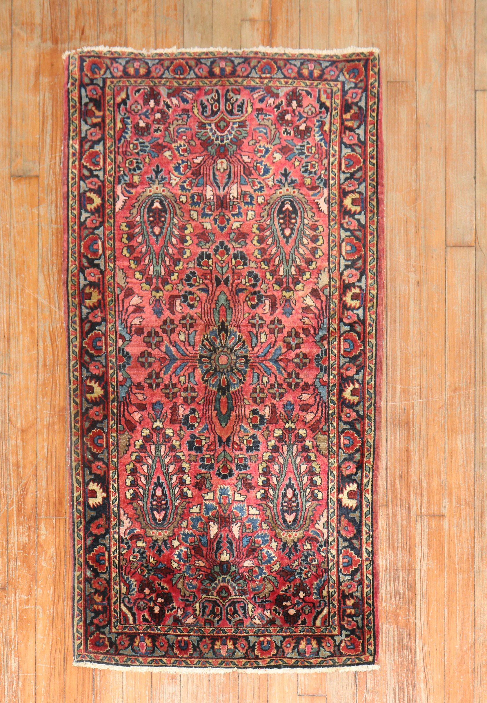 An early 20th century traditional Persian Sarouk rug 

Measures: 2'1'' x 4'1”.

.