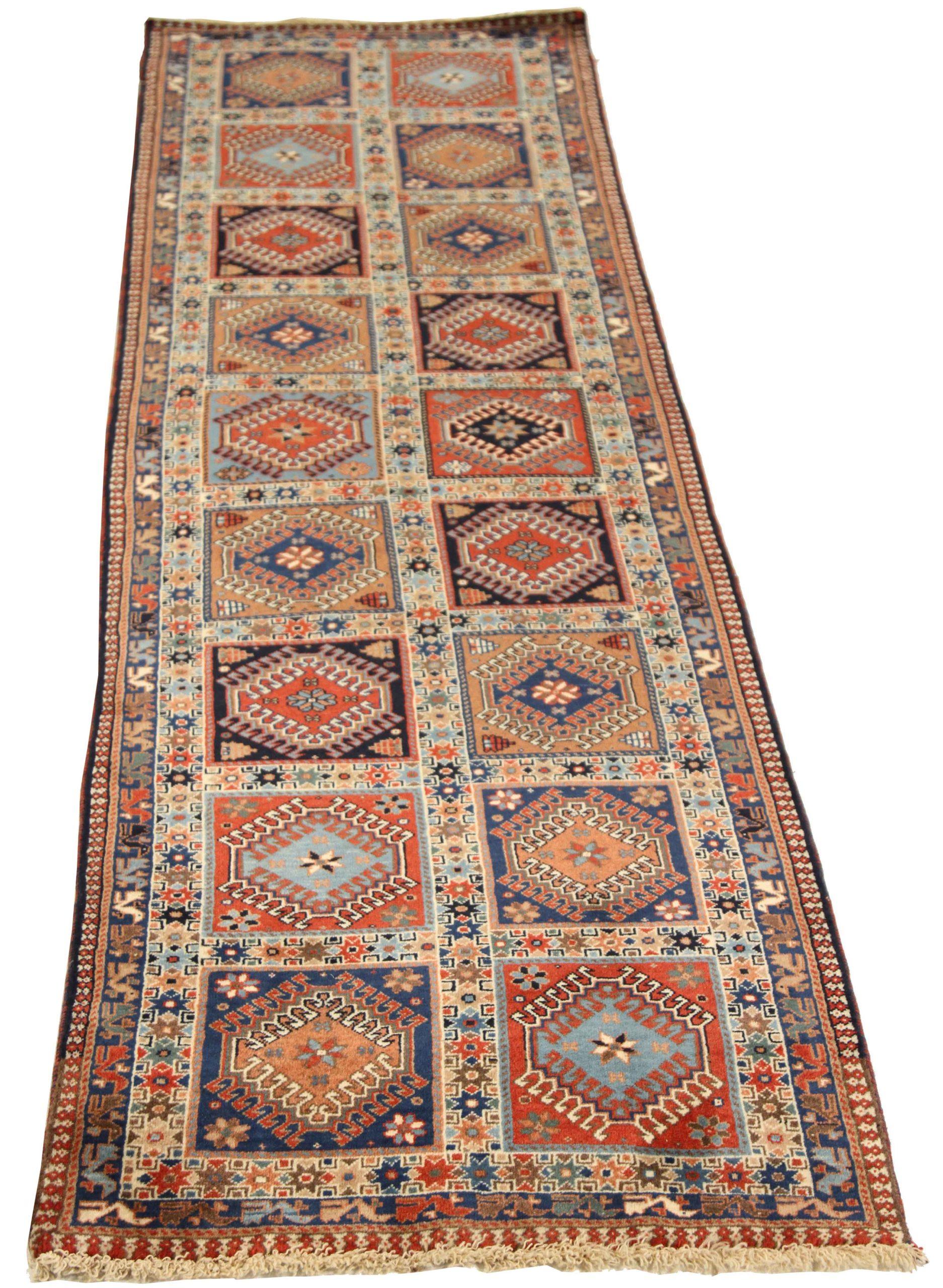 Discover the elegance of Persian Shiraz featuring Runner Rug in Circa 1910. Designed with Wool and BlueIvoryRed, this exclusive design is perfect for enhancing your space.