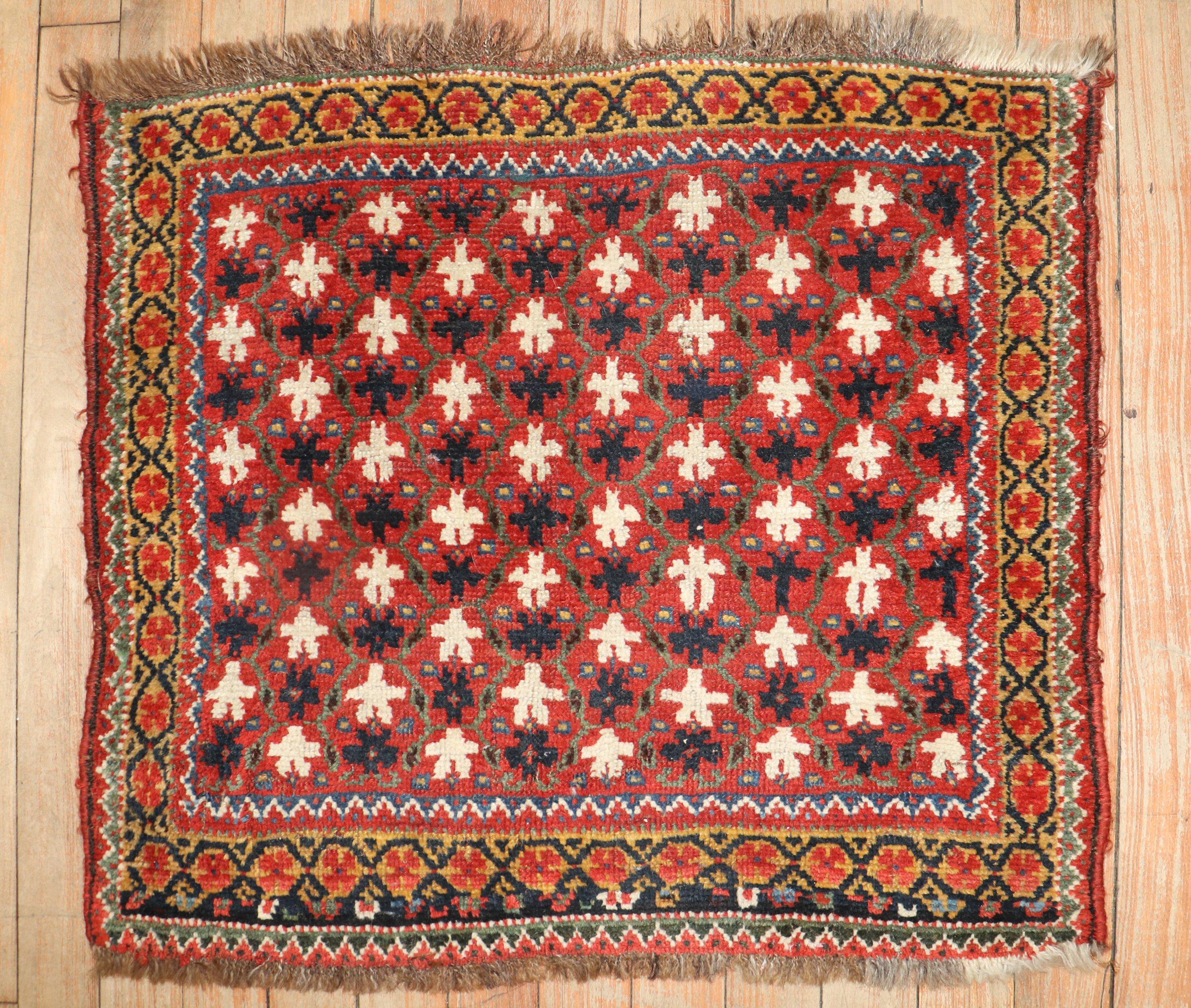 An early 20th century Persian Shiraz Throw Size Rug

1'10'' x 2'1''.