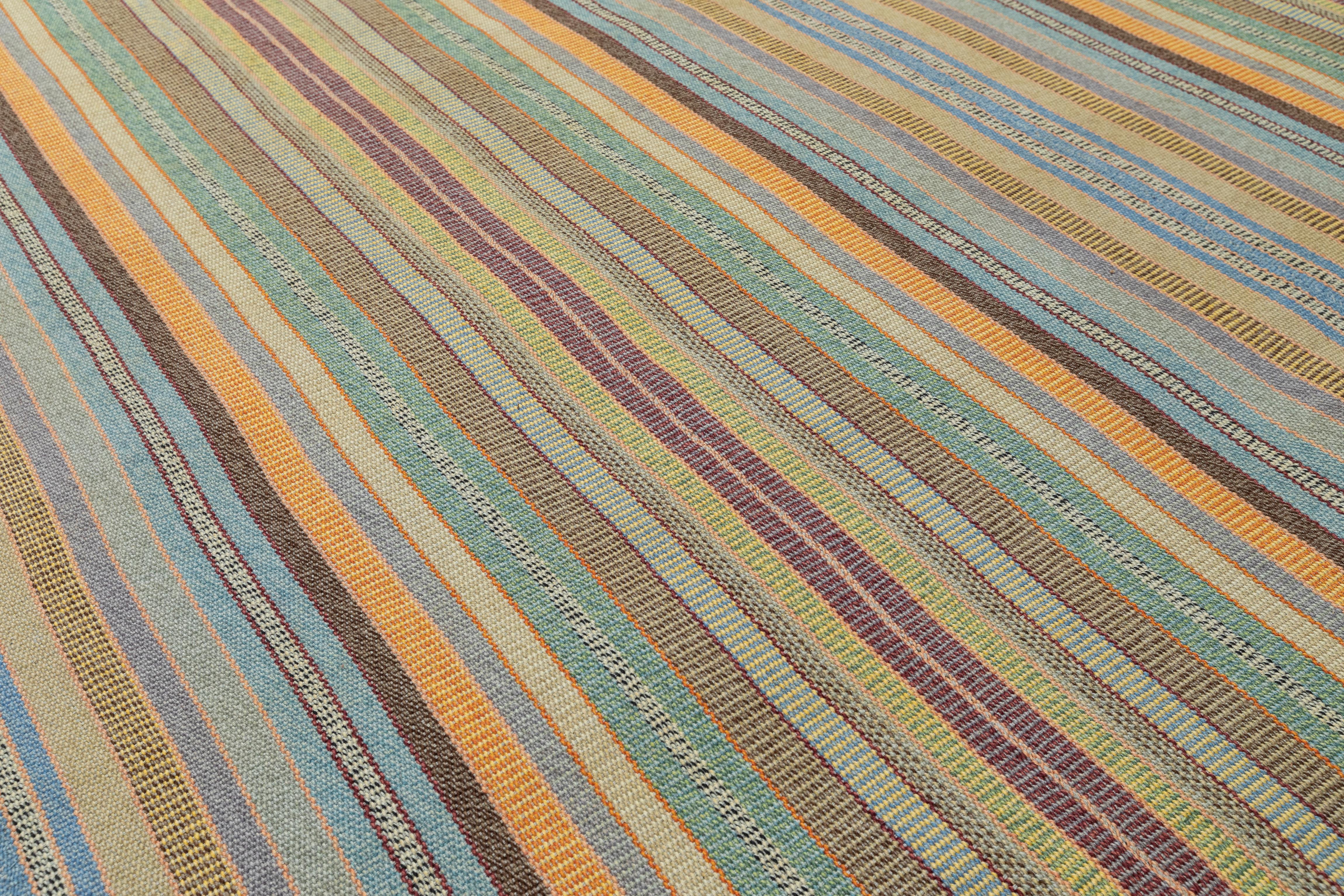 Elevate your space with this handcrafted Persian flat weave rug, woven from premium hand-spun wool and dyed with natural vegetable pigments. Its harmonious neutral-toned stripes, accented with earthy and muted hues, create a timeless aesthetic