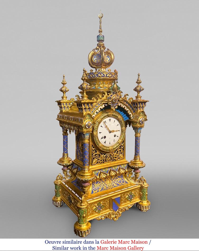 Charles Stanislas Matifat is the creator of this ensemble consisting of a double-sided enameled bronze clock and a matching pair of large garnitures. Dated 1851 and bearing his signature, the clock was designed for both European tastes and the