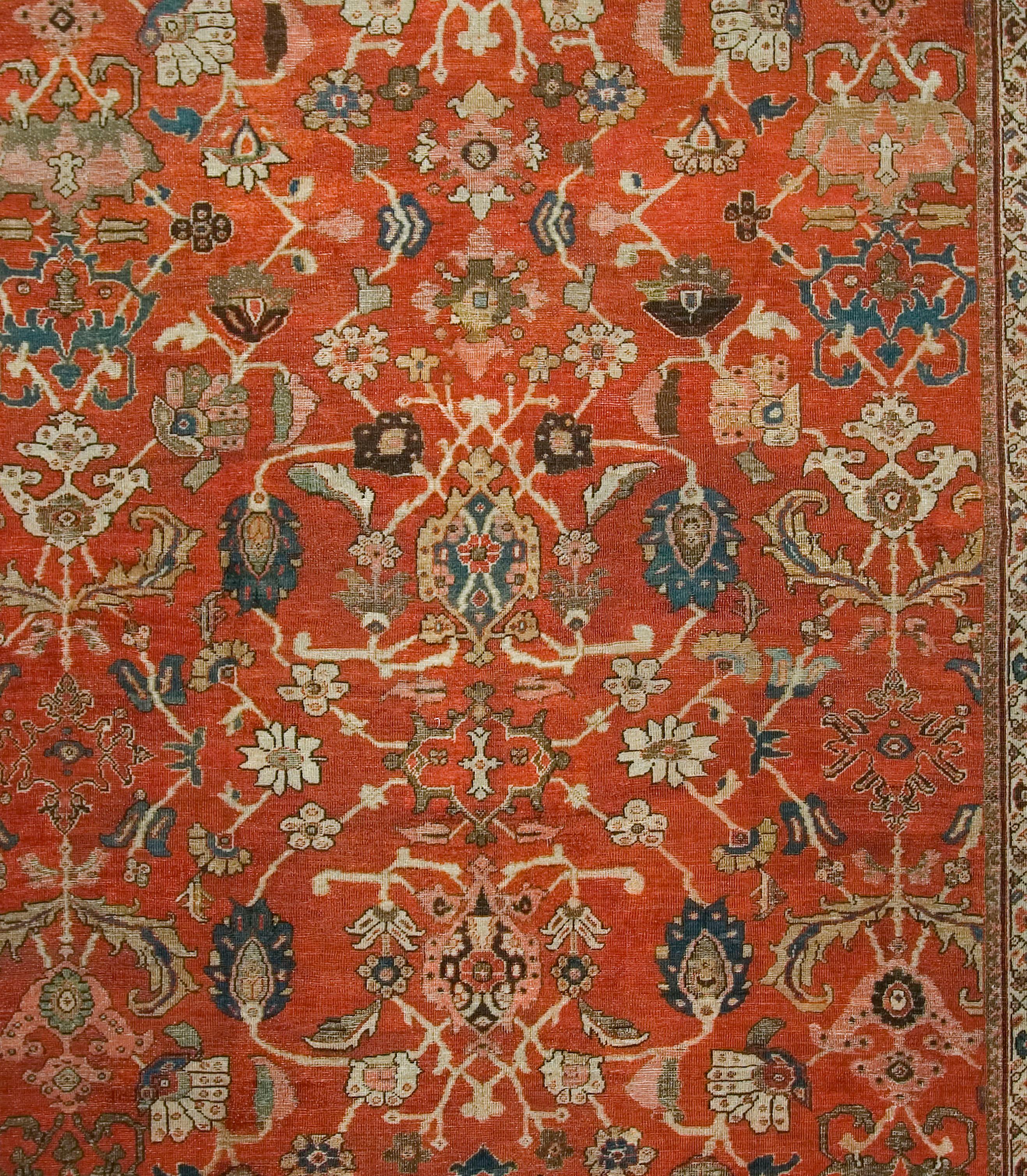 Persian Sultanabad rug carpet, circa 1880, 10'3 x 13'10. Bold overall patterns were a specialty of the Manchester-based Ziegler Company in Sultanabad in the 1900 epoch. Although the patterns are clearly “oriental”, they do not copy or even closely