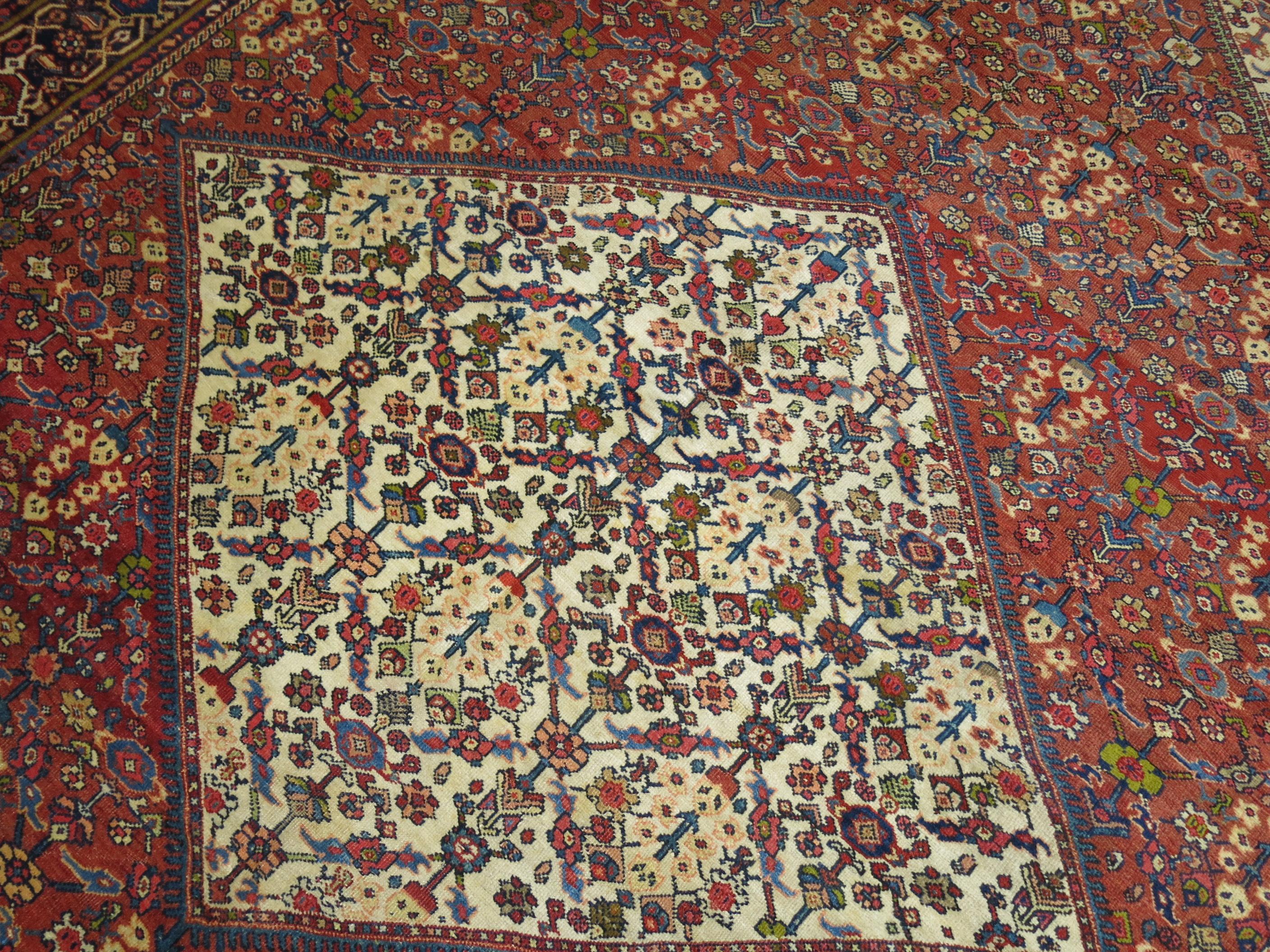 An authentic handmade one-of-a-kind Persian Sultanabad rug with a large-scale masculine geometric design.

9'4'' x 12'6''