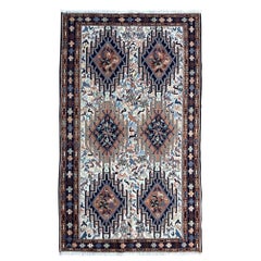 Tapis Kilim persan à motif d'animaux tribaux multicolores Sumak