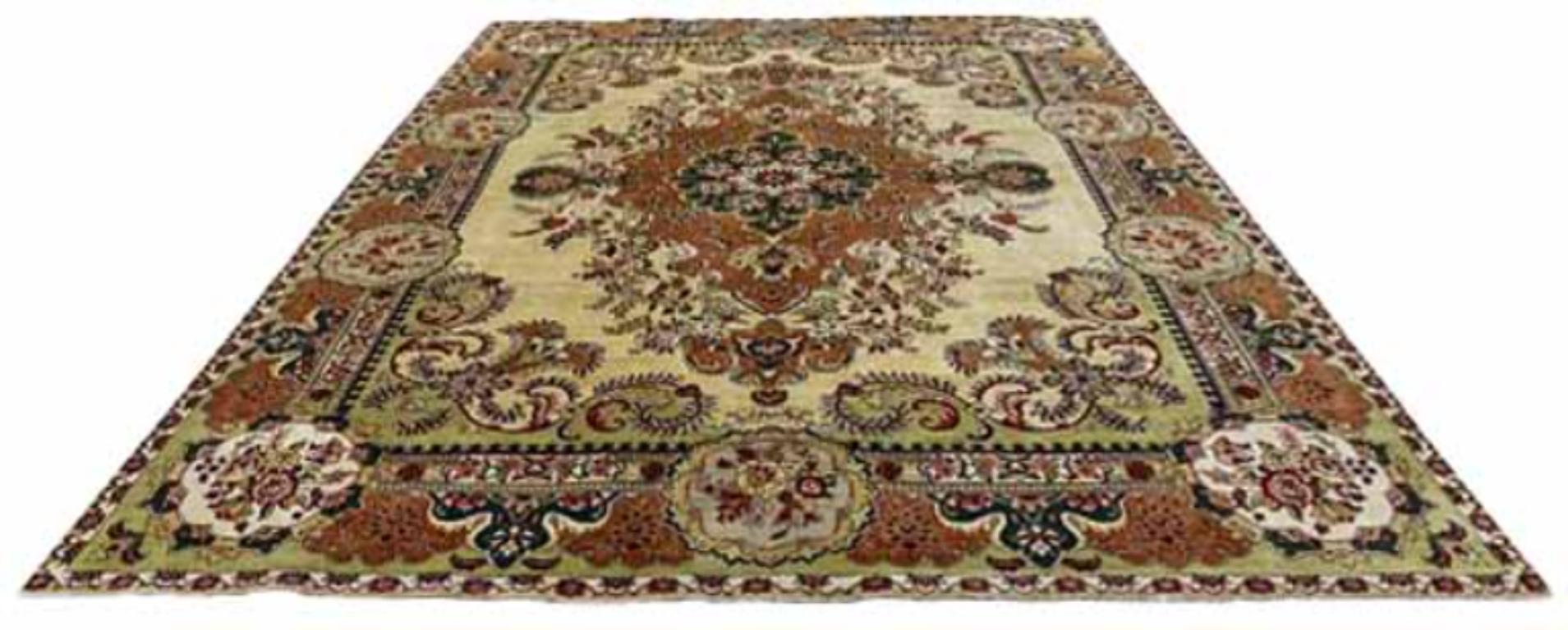 Discover the elegance of Persian Tabriz featuring Area Rugs in Circa 1940. Designed with Wool and GreenIvoryOrange, this exclusive design is perfect for enhancing your space.