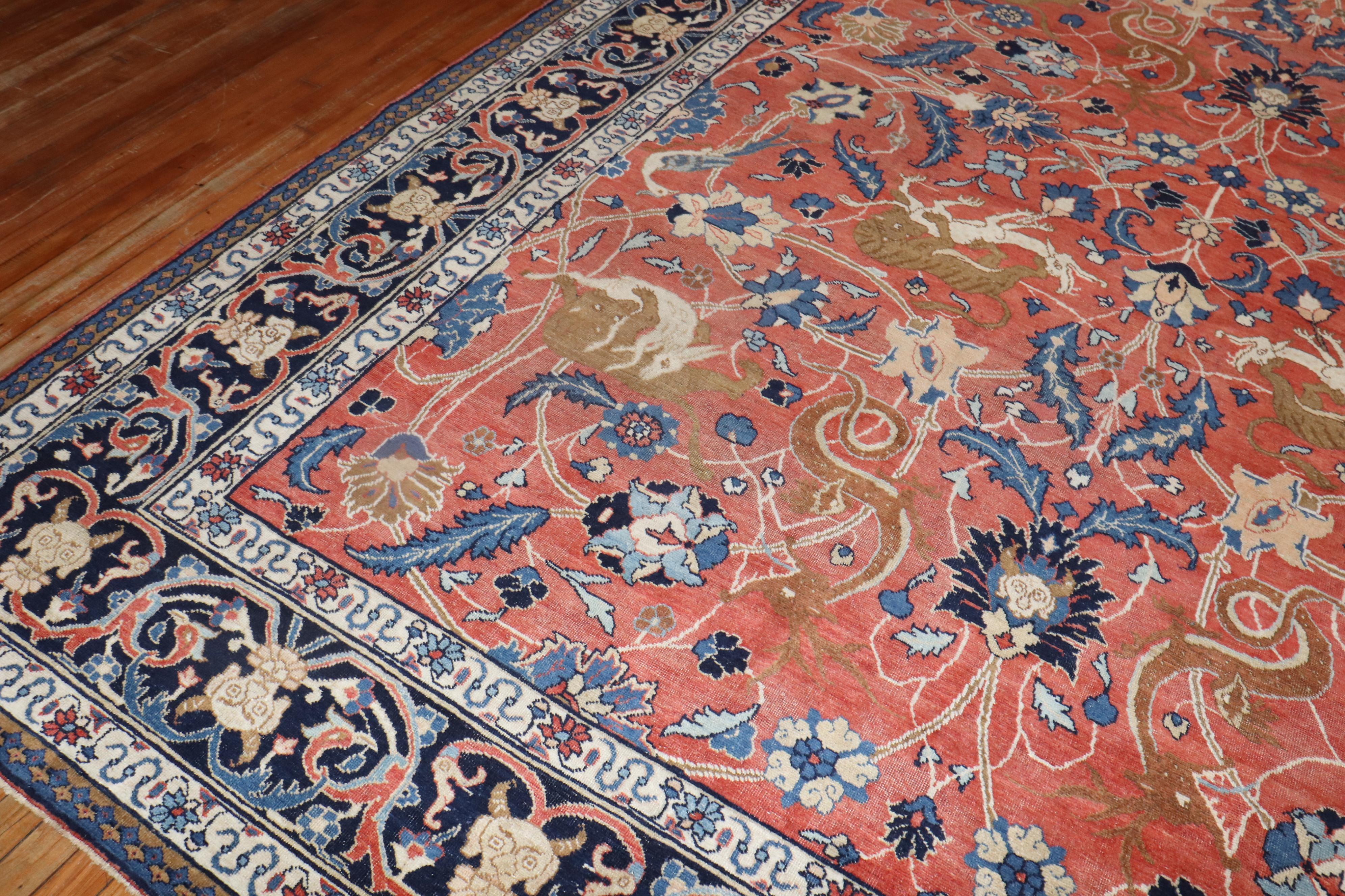Zimmergroßer persischer Täbriz-Teppich mit einem bildlichen Tierjagd-Muster aus dem 1. Quartal des 20.

Maße: 9'7'' x 12'10''.