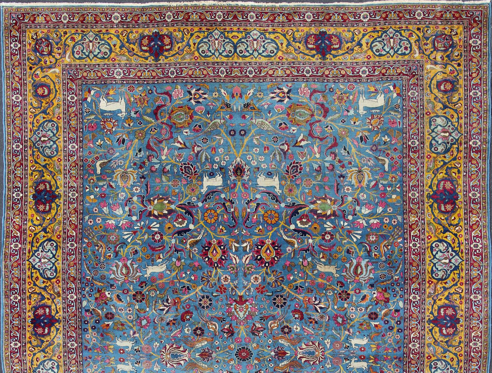 Antique Persian Tehran rug in beautiful Persian blue and saffron yellow. Keivan Woven Arts / rug EMA-7515, country of origin / type: Iran / Tehran, circa 1920. Unique Persian Tehran rug. Colorful Persian Tehran in blue with floral design.
Measures: