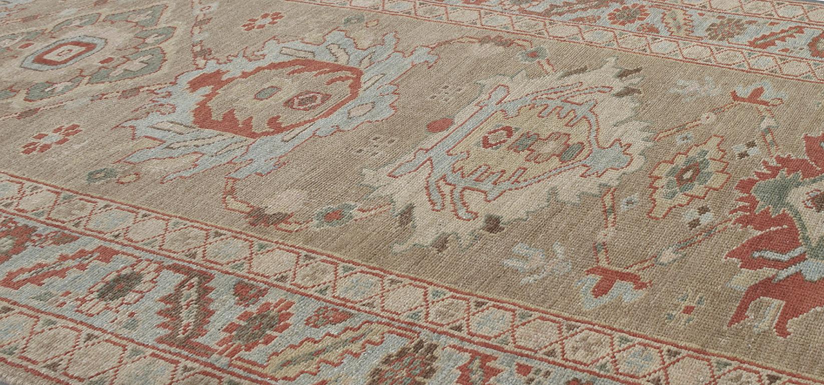 Made in Iran with the highest quality Persian hand-carded, hand-spun-wool and all vegetable dyes, this runner rug resembles the original prized antique Bakshaish rugs made in town of the same name. Located in the Heris region, it's noted as an area