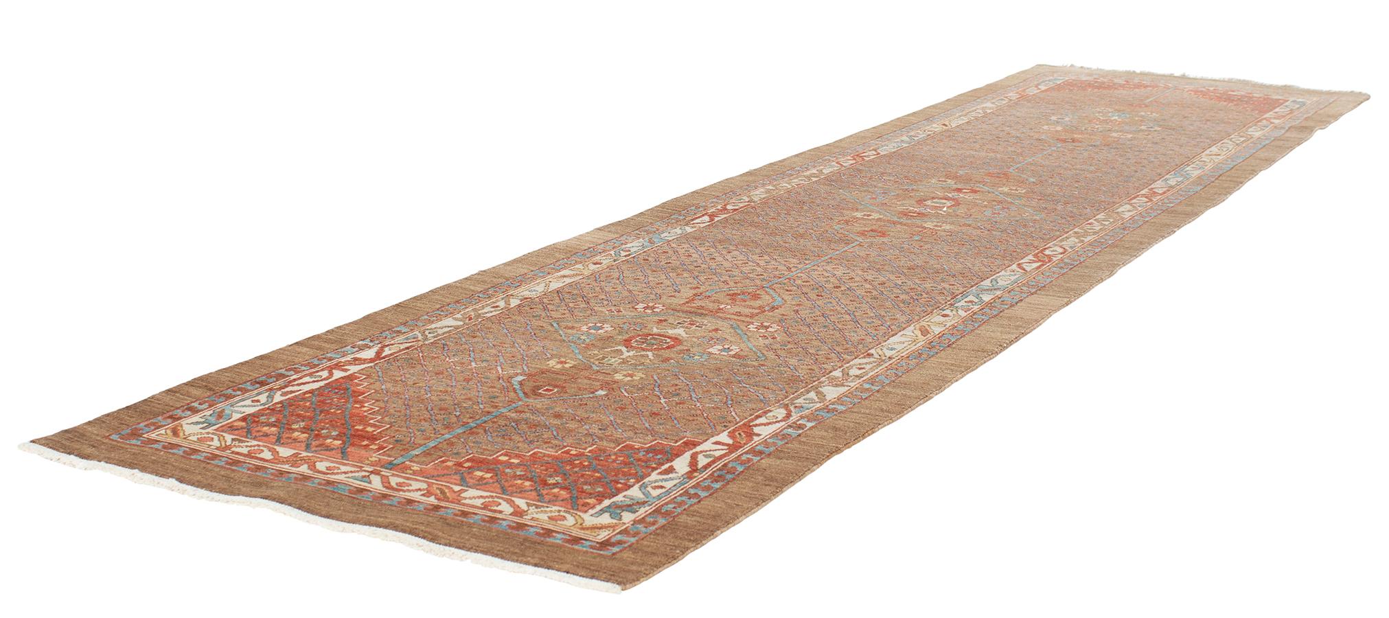 Made in Iran with the highest quality Persian hand-carded, hand-spun-wool and all vegetable dyes, this runner rug resembles the original prized antique Bakshaish rugs made in town of the same name. Located in the Heris region, it's noted as an area