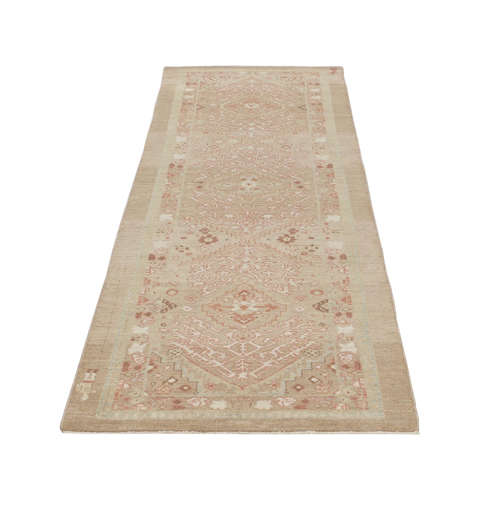 This Persian tribal hand-knotted runner rug is crafted with the finest hand-carded, hand-spun wool, and is made with all natural dyes. It resembles the antique original pieces designed by the Kurdish weavers in the northwestern part of Iran. Custom