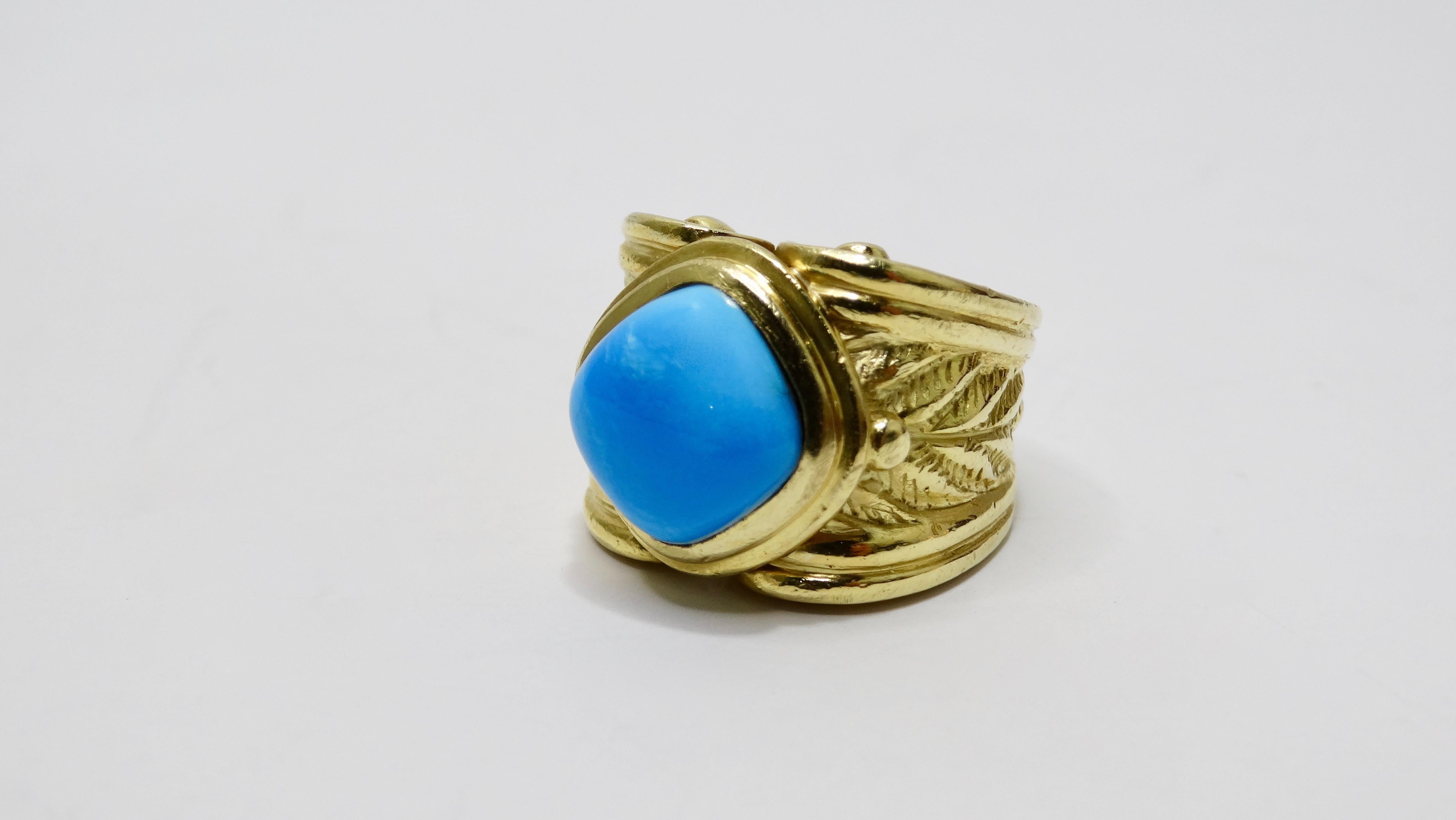 Add this stunning antique to your collection! Circa mid-20th century, this cocktail ring features a gorgeous vibrant Cabochon cut Persian Turquoise stone set in a solid 18k Gold decorative Victorian era band. Rings total weight in grams is 22 and is