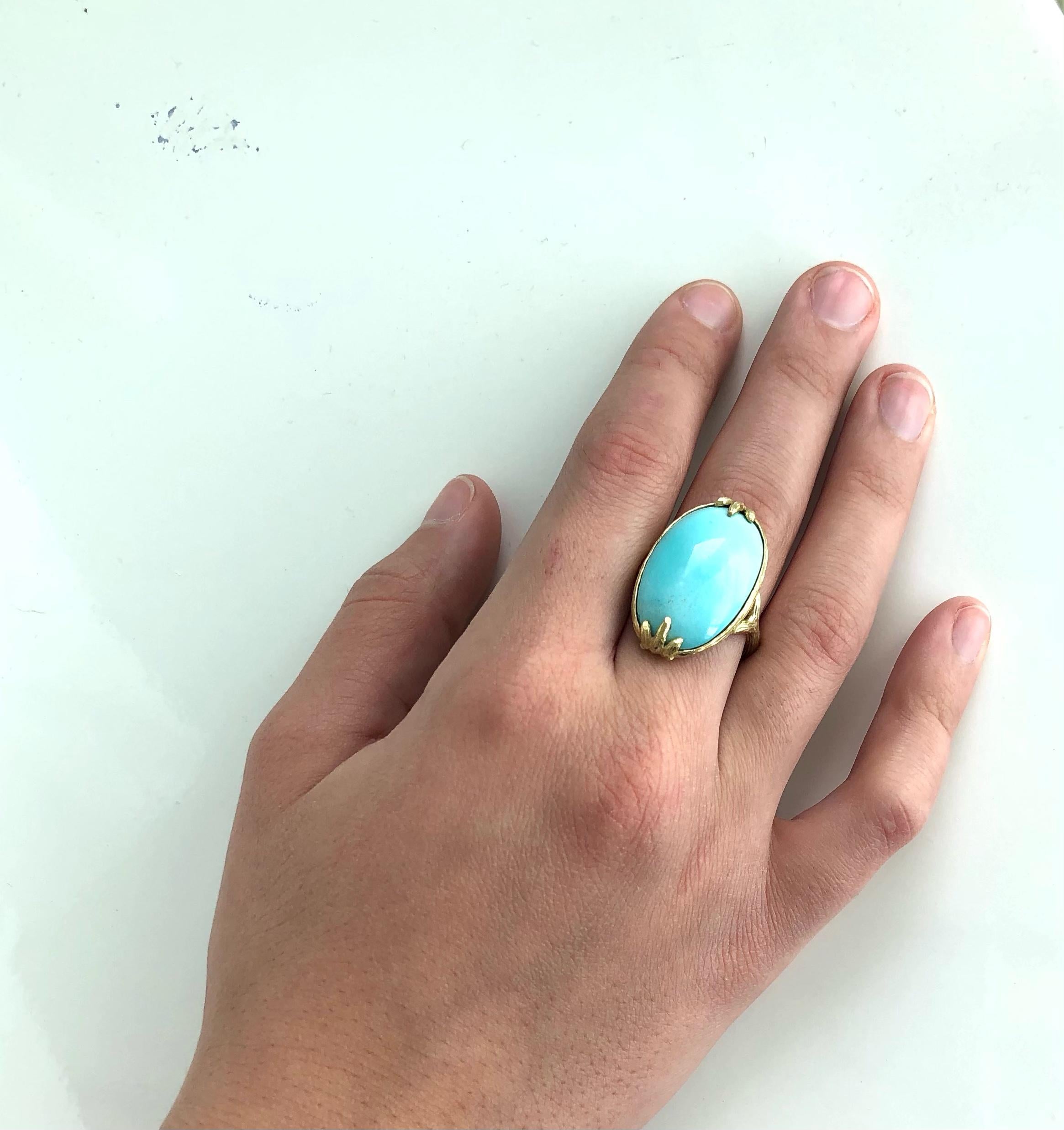 
Time-honored, sky blue Persian turquoise- considered the best and rarest- is the bold yet soothing centerpiece of this creation. The smooth cabochon is embraced by the 18k gold twig-textured shank. This ring makes a quiet but memorable