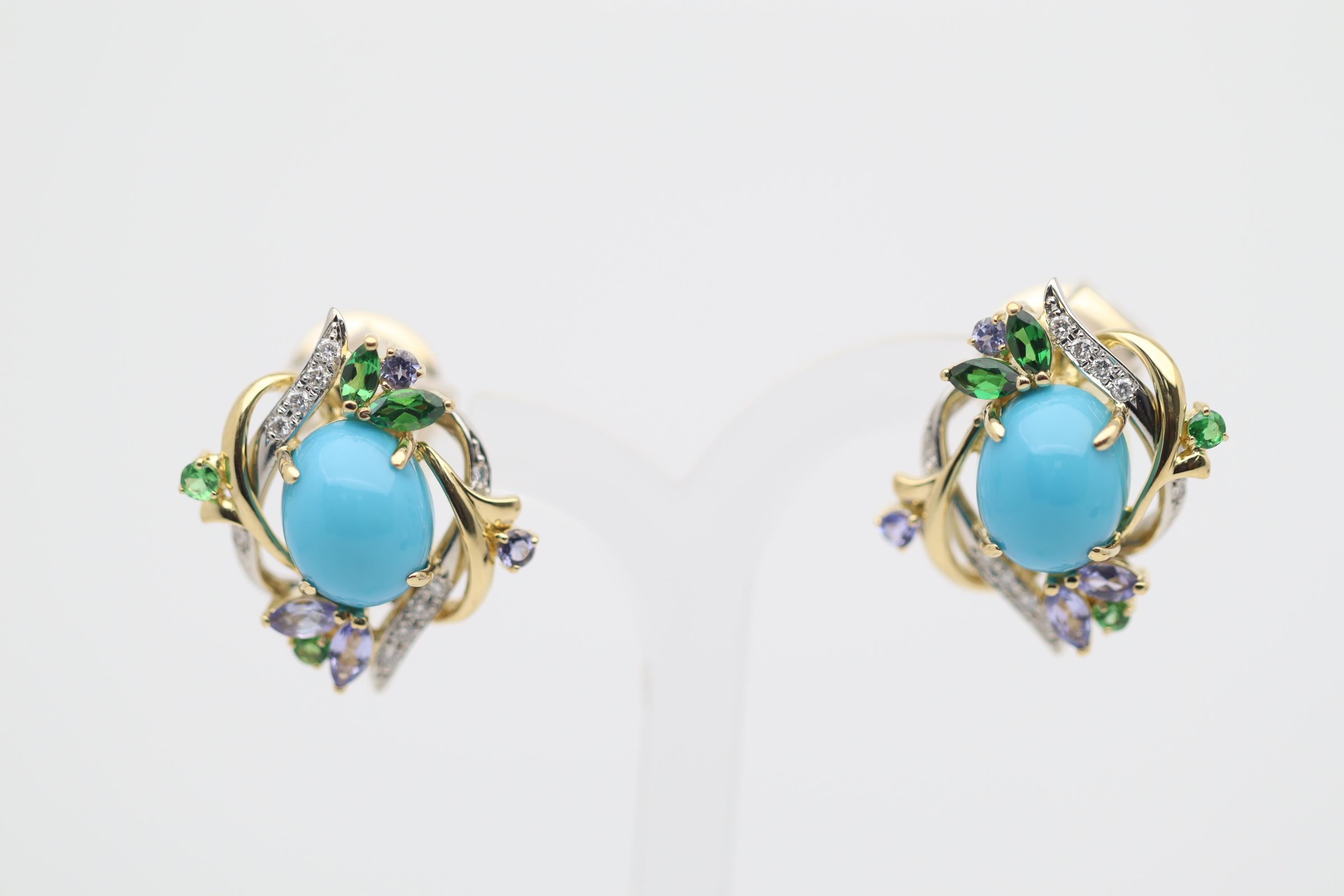 A fun and beautiful pair of earrings featuring two pieces of fine Persian turquoise. They weigh 4.98 carats total and have a rich, even sky-blue color. Accenting them are 0.14 carats of diamonds, 1.02 carats of vivid green tsavorites as well as