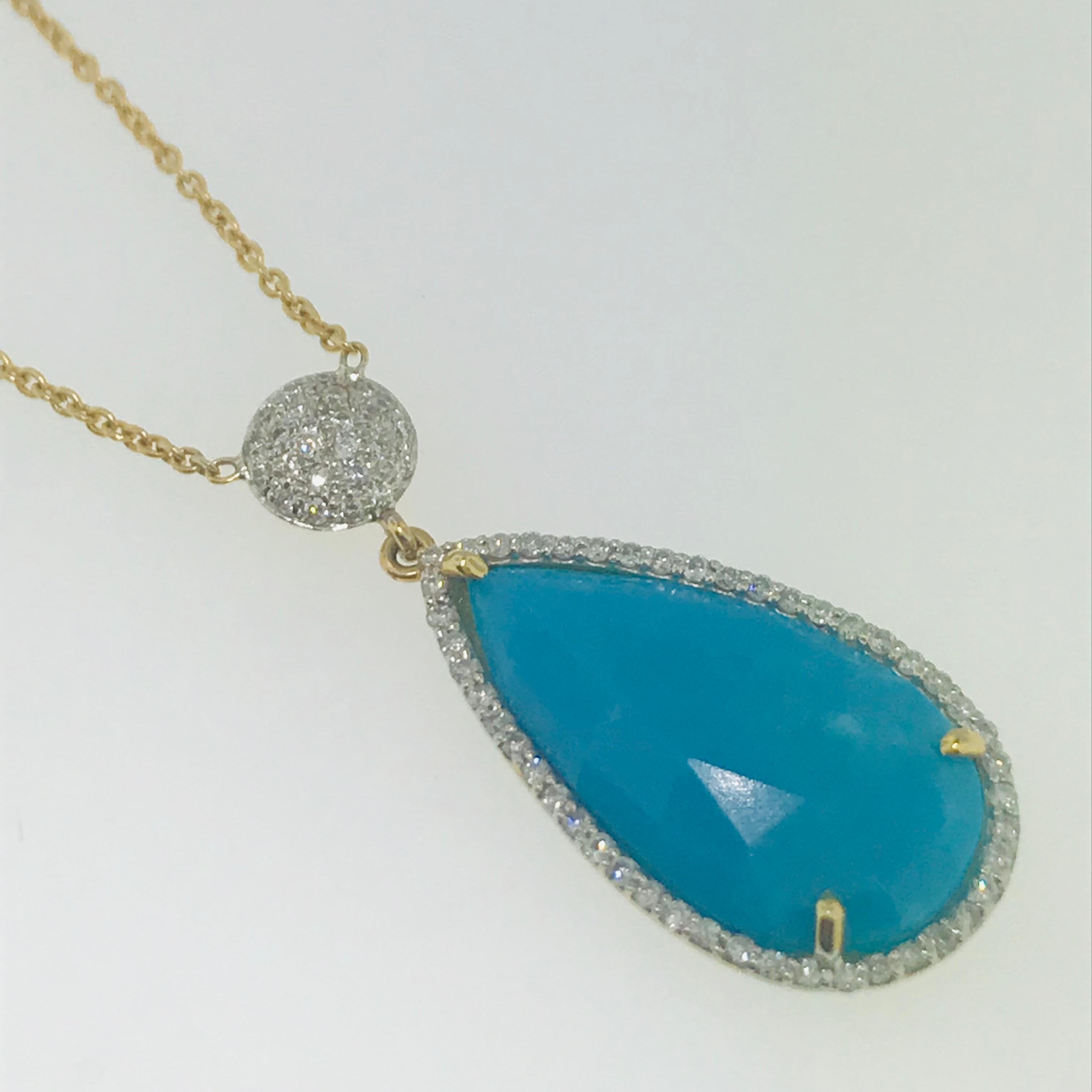Turquoise and Diamond Cluster Necklace in beautiful 18 karats yellow gold -Original. This original piece is essential! This design highlights a genuine Persian turquoise from the mines of Iran. These stones sourced from Iran tend to be much harder