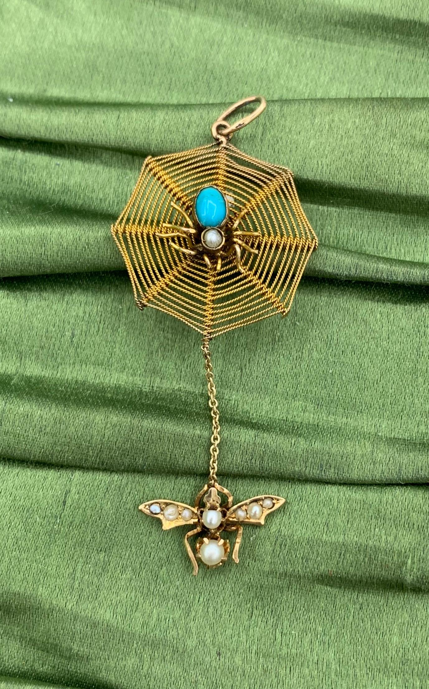 This is an absolutely wonderful and rare antique Victorian - Edwardian Spider Web and Fly Pendant set with gorgeous Persian Turquoise and Pearls in beautiful antique gold.  The elegant spider is set with an oval Persian Turquoise cabochon gem as the