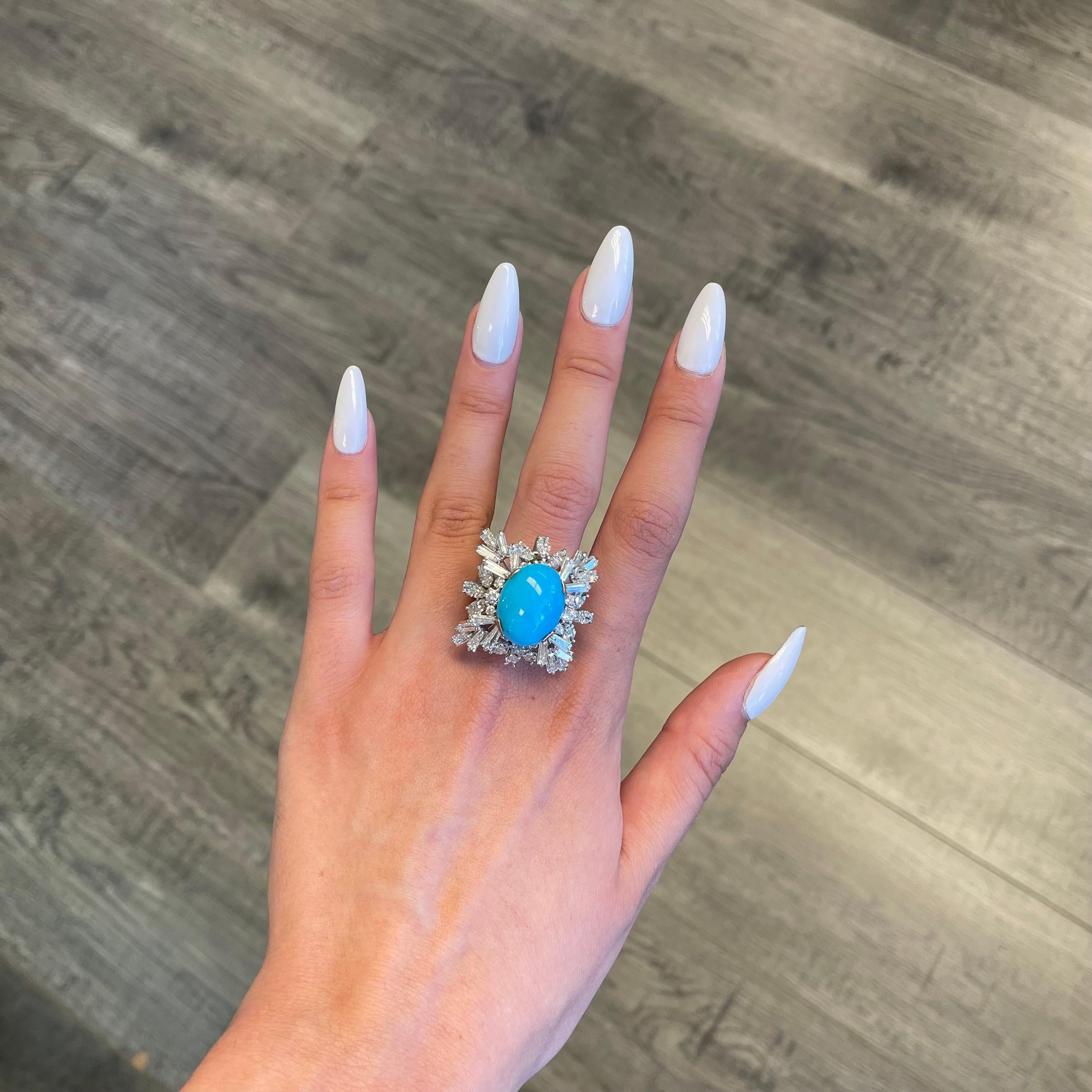 Vintage Persian turquoise with diamonds ring, circa 1960's.  
Oval cabochon Persian turquoise surrounded by apx 3.70ct of round, marquise and tapered baguette diamonds. 18k white gold. Accommodated with an up to date appraisal by a GIA G.G., please