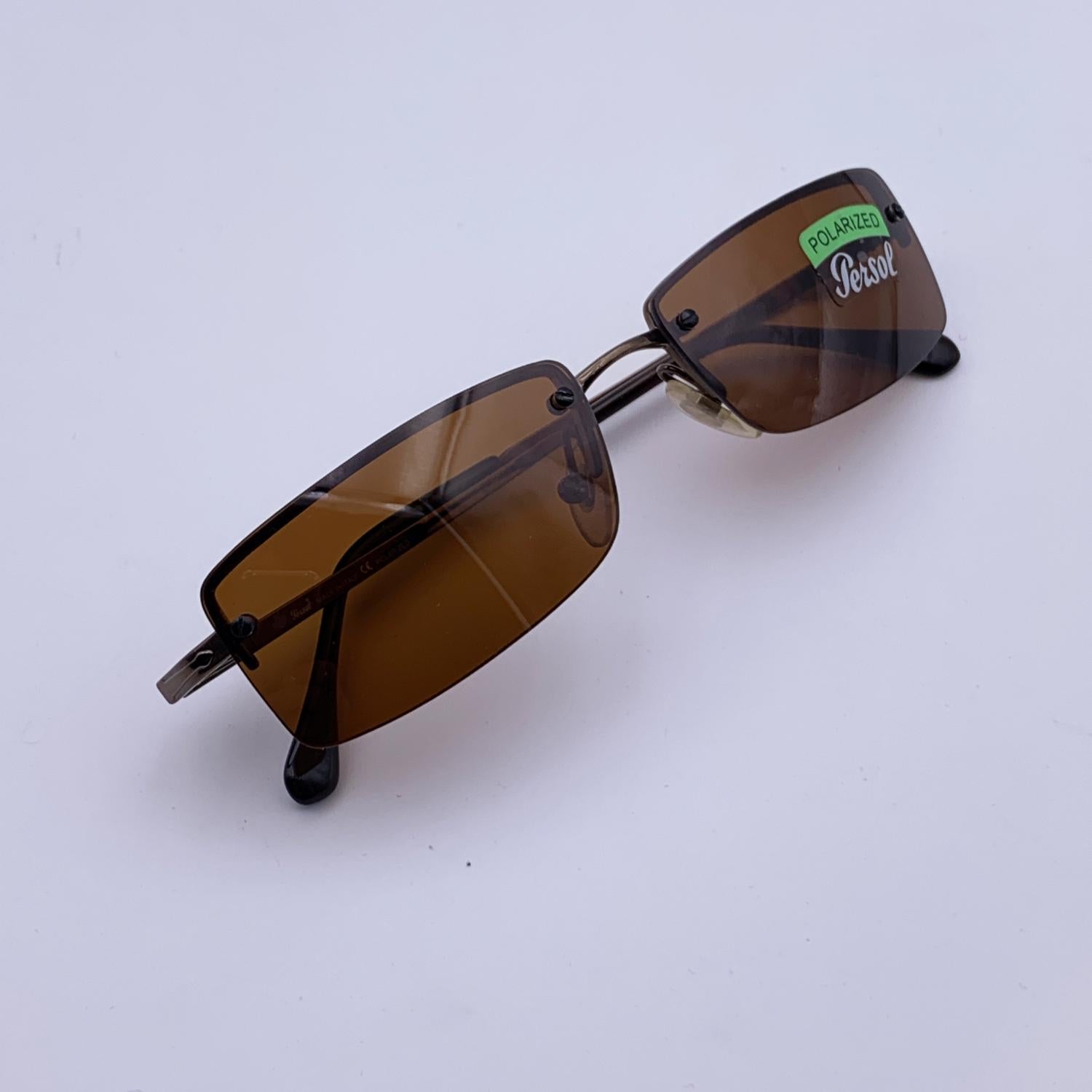 Legendary PERSOL RATTI Vintage Rectangle rimless Sunglasses - Mod. 2193-S - 135 - 55/15 - 618/83. Brown original polarized Persol lenses- 100% UV protection- Flexible temple. Made in Italy

Details

MATERIAL: Metal

COLOR: Brown

MODEL: