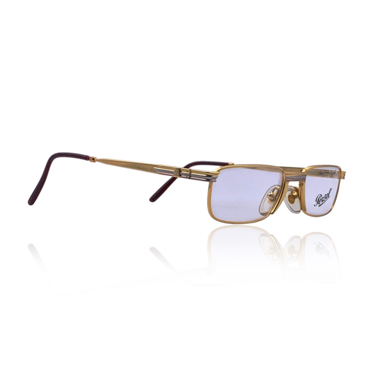 PERSOL Ratti Vintage Eyeglasses- Model: Landor. Gold metal frame with silver metal accents. Rectangular design. Clear demo lenses. Flexible temples. Made in Italy. Details MATERIAL: Acetate COLOR: Gold MODEL: Landor GENDER: Unisex Adults COUNTRY OF