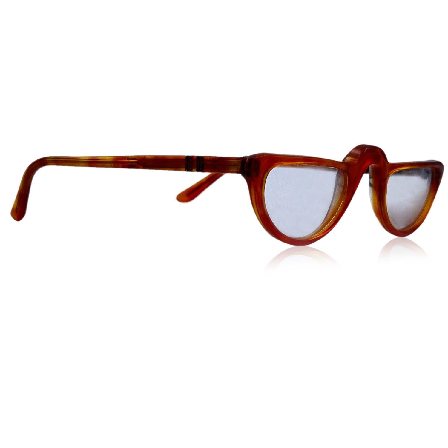 Vintage PERSOL Meflecto Ratti Eyeglasses, mod. 'Lect 92'. Brown acetate frame. Clear demo lenses. Flexible temples thanks to Meflecto system. Details MATERIAL: Acetate COLOR: Brown MODEL: Lect 92 GENDER: Unisex Adults COUNTRY OF MANUFACTURE: Italy