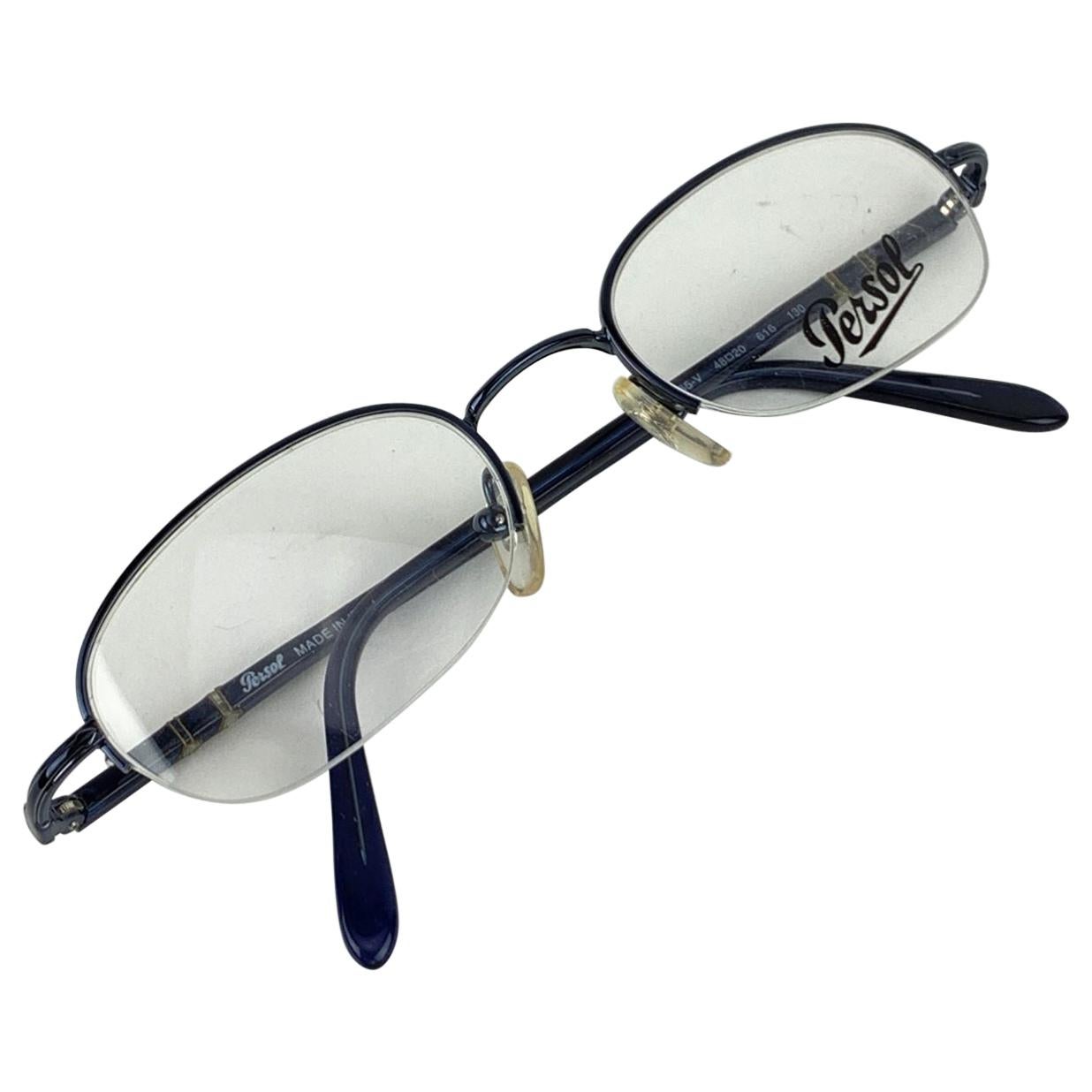 PERSOL Vintage Eyeglasses- Model: 2065-V. Half Rim design. Blue metal frame. Clear demo lenses. Meflecto System on arms (2 metal pins which are inserted vertically into the ear stems and provide flexibility in the stems). Made in Italy. Style &