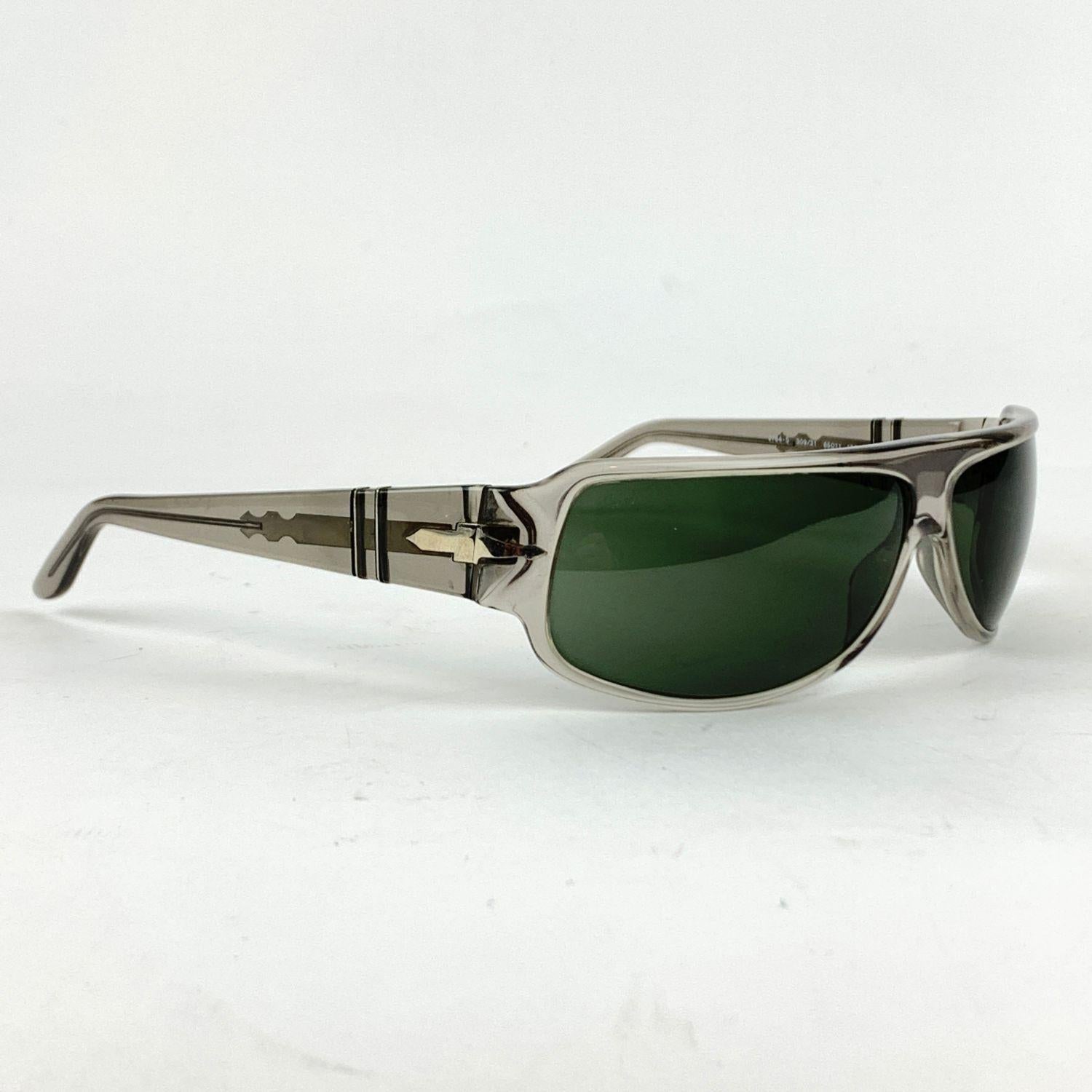 PERSOL Vintage Sunglasses- Model: 2764-S . Grey acetate frame. Original Persol lenses. 100% UV protection. Meflecto System on arms (4 metal pins which are inserted vertically into the ear stems and provide flexibility in the stems). Hand Made in