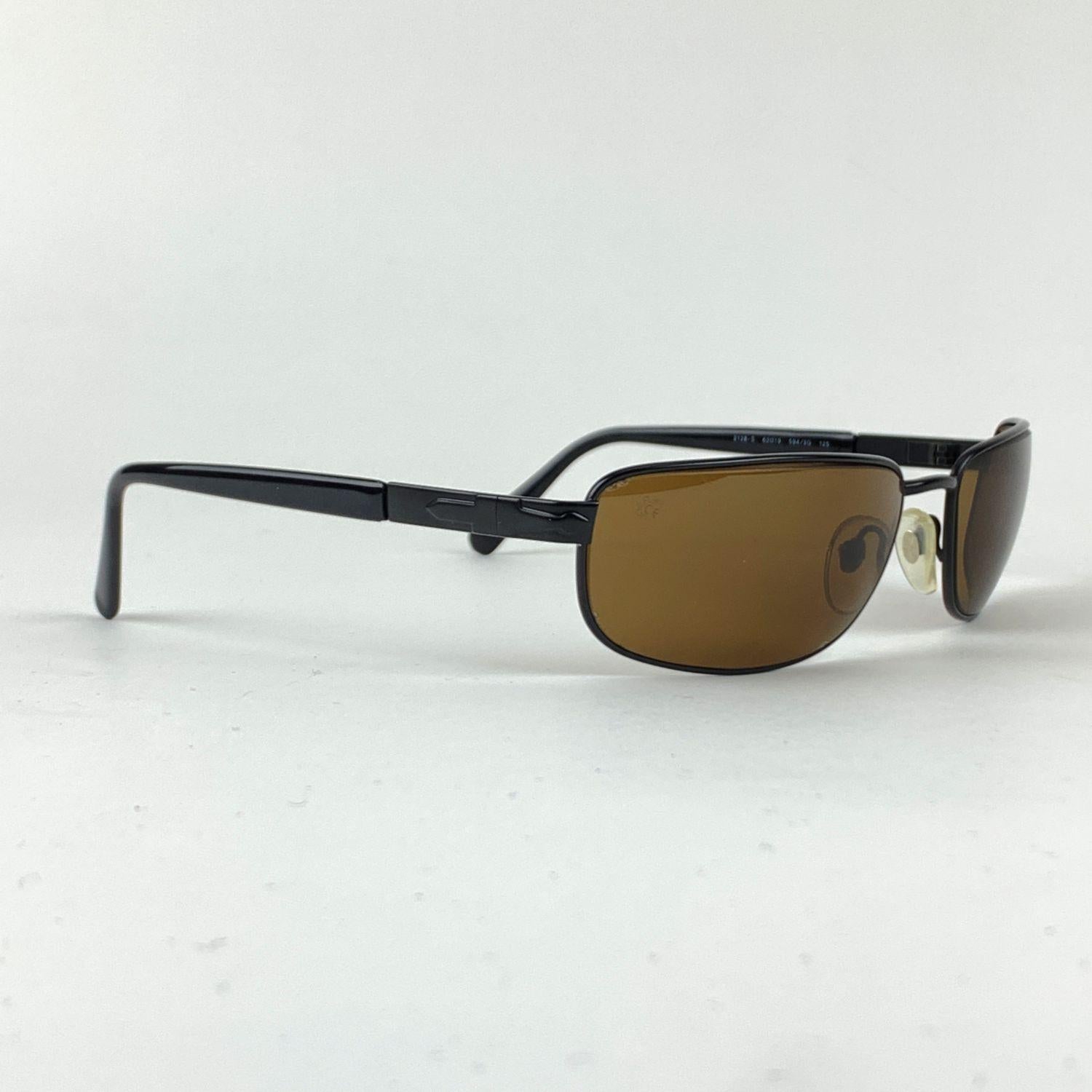 PERSOL sunglasses mod. 2128S. Rectangular handmade black metal sunglasses from early 90s by PERSOL. Flex hinges. Adjustable nose pads. Brown original lenses (PERSOL mark on lens). Made in Italy. Style & Refs: 2128-S - 62/19 - 125 -