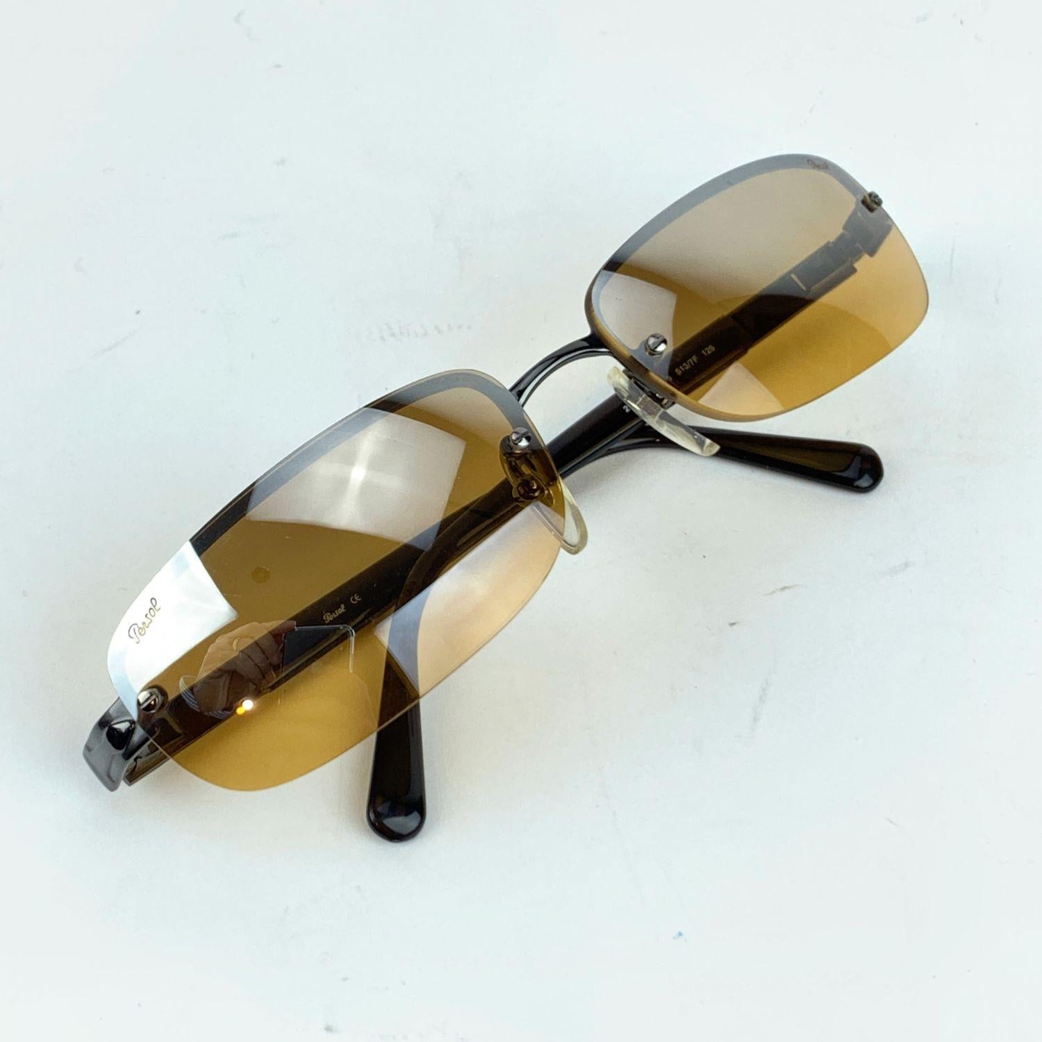 PERSOL Vintage Sunglasses- Model: 2131-S. Rimless frame with gunmetal structure. Original Persol mirrored lenses. 100% UV protection. Flex hinges. Hand Made in Italy. Style & Refs: 2131-S - 60/15 - 513/7F - 125

Details

MATERIAL: Metal

COLOR: