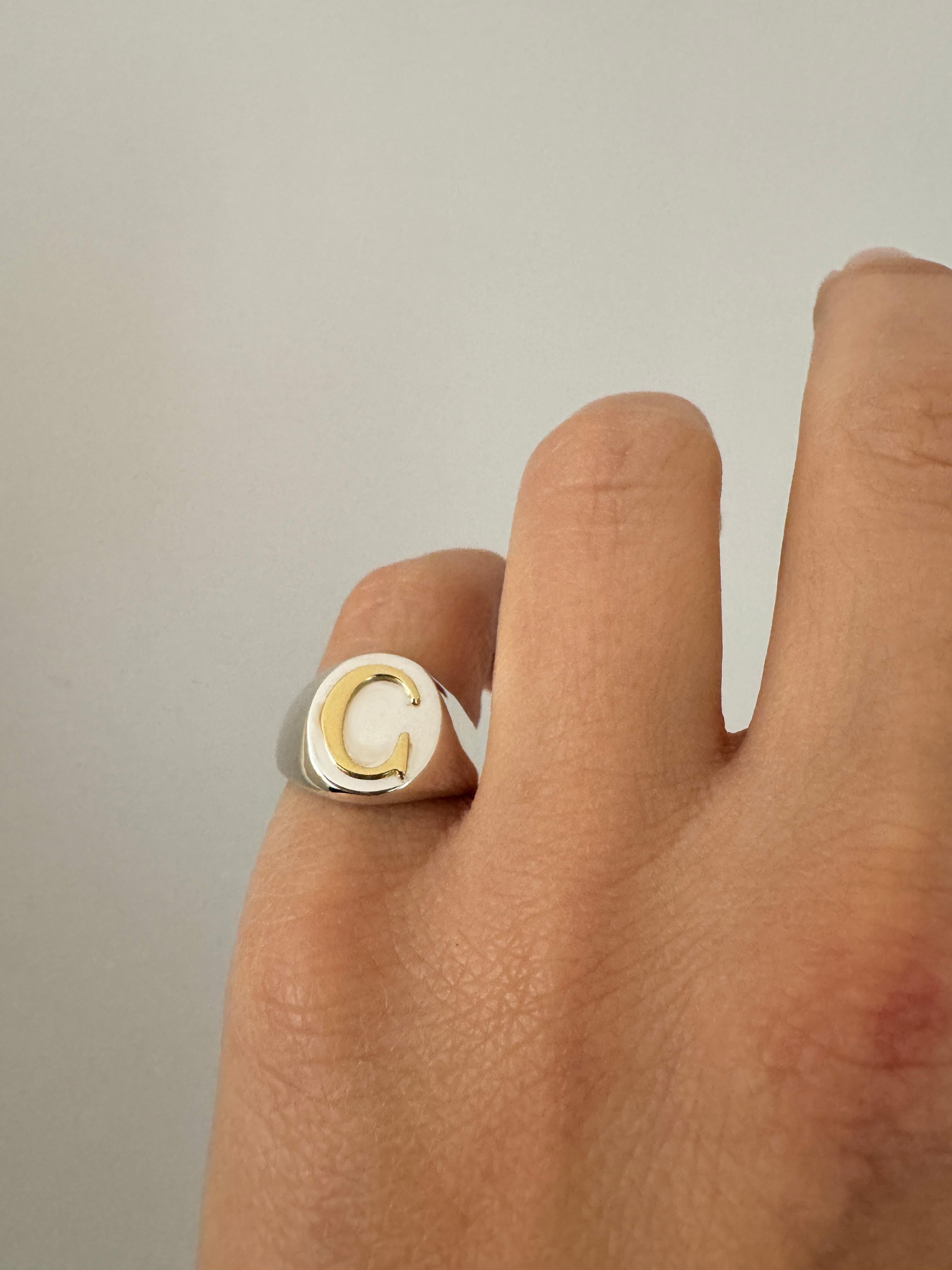 Rossella Ugolini Signet Ring Collection Modern Signet Ring. Handcrafted Initials made of 18K Yellow Gold crafted on Bold Silver Sterling Signet Ring. Signet Initial Rings are among the best  for personalising a jewelry look. Message us and we can