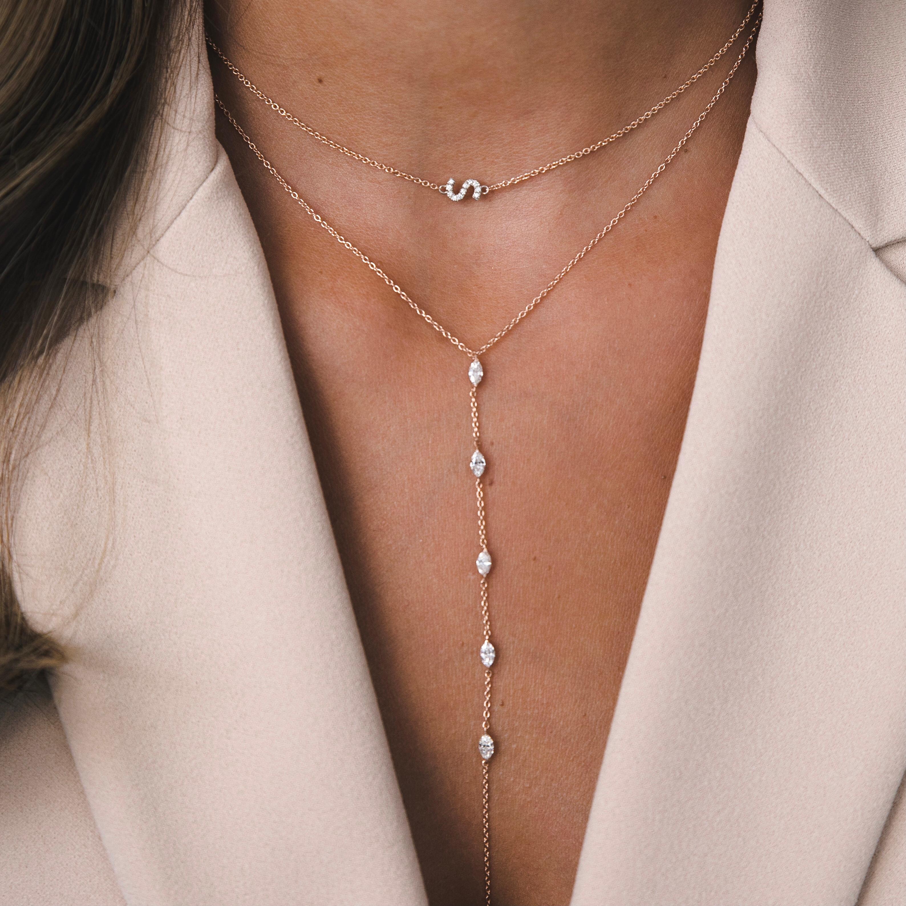 Personalised Diamond Letter Initial Necklace in 14k Rose Gold - Shlomit Rogel

Make it personal!
Beautifully handcrafted in 14k rose gold, this necklace features an asymmetrical initial of your choice made from 14K white gold and embellished with