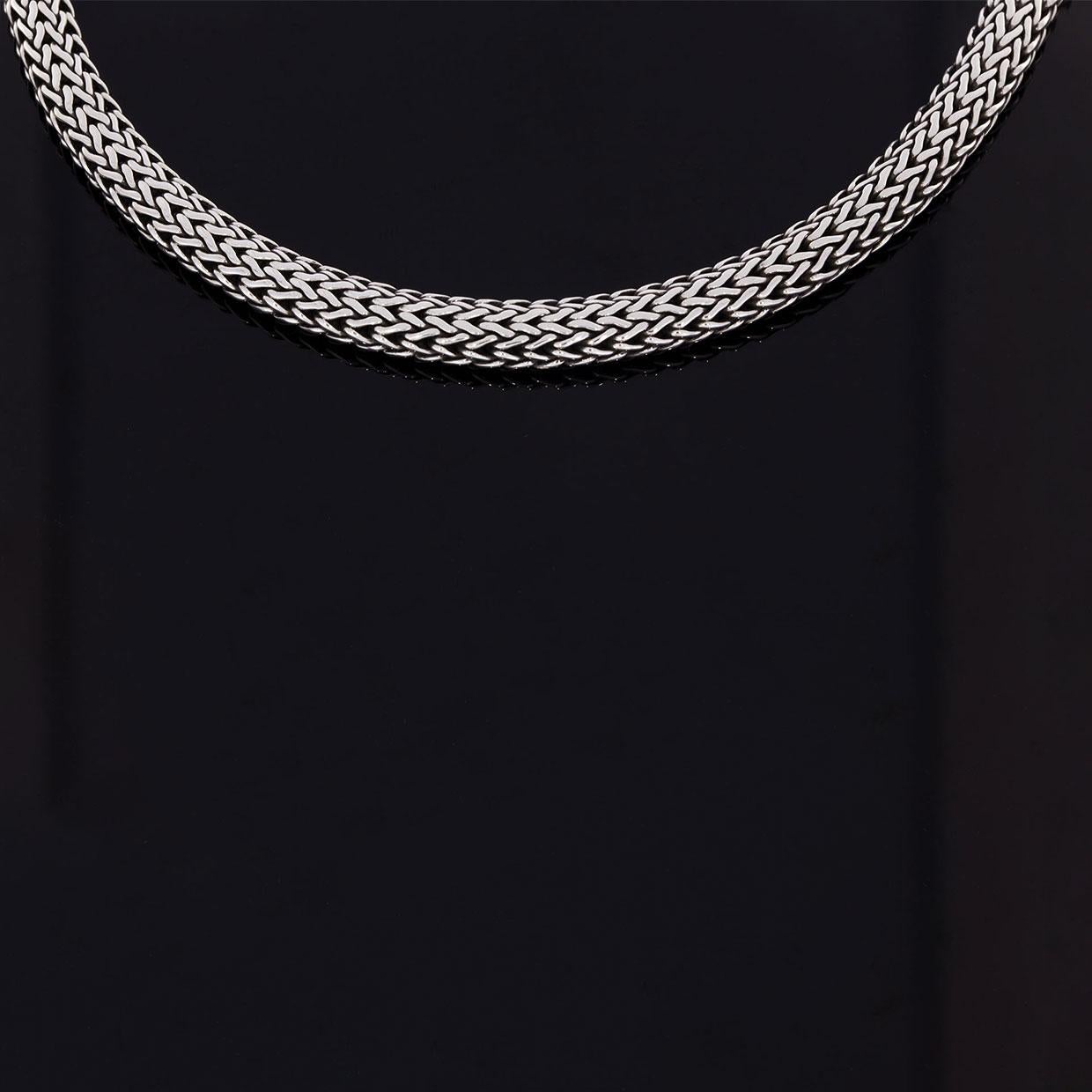 A timeless classic from John Hardy is this beautiful woven wheat chain. Comprised of sterling silver, this versatile necklace measures 6 millimeters in width & 18