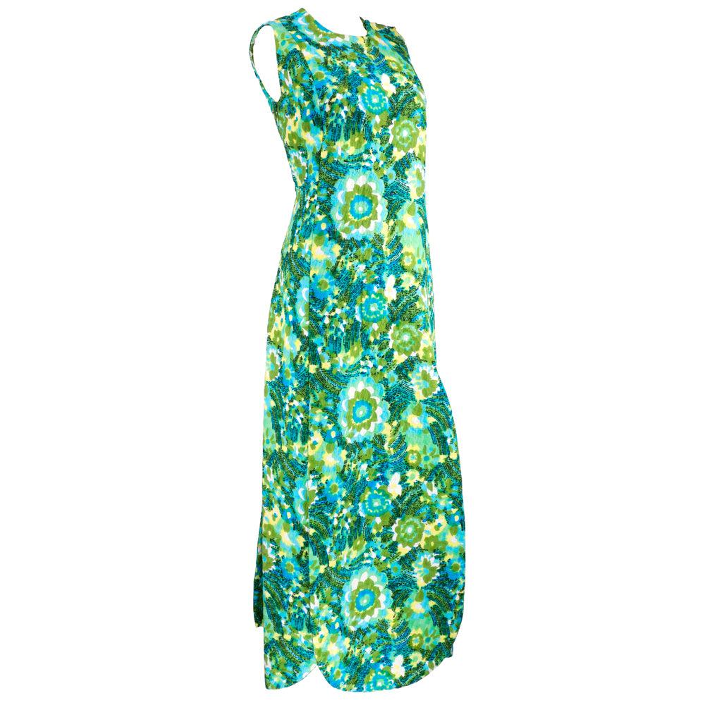 Super 60s maxi dress from Spanish Designer Pertagaz. Predominantly green tones in a watercolor floral on cotton matelasse. Petaled hem with high, high slits. Great summer evening look - or California casual for every day. Shoulder snaps open - zips