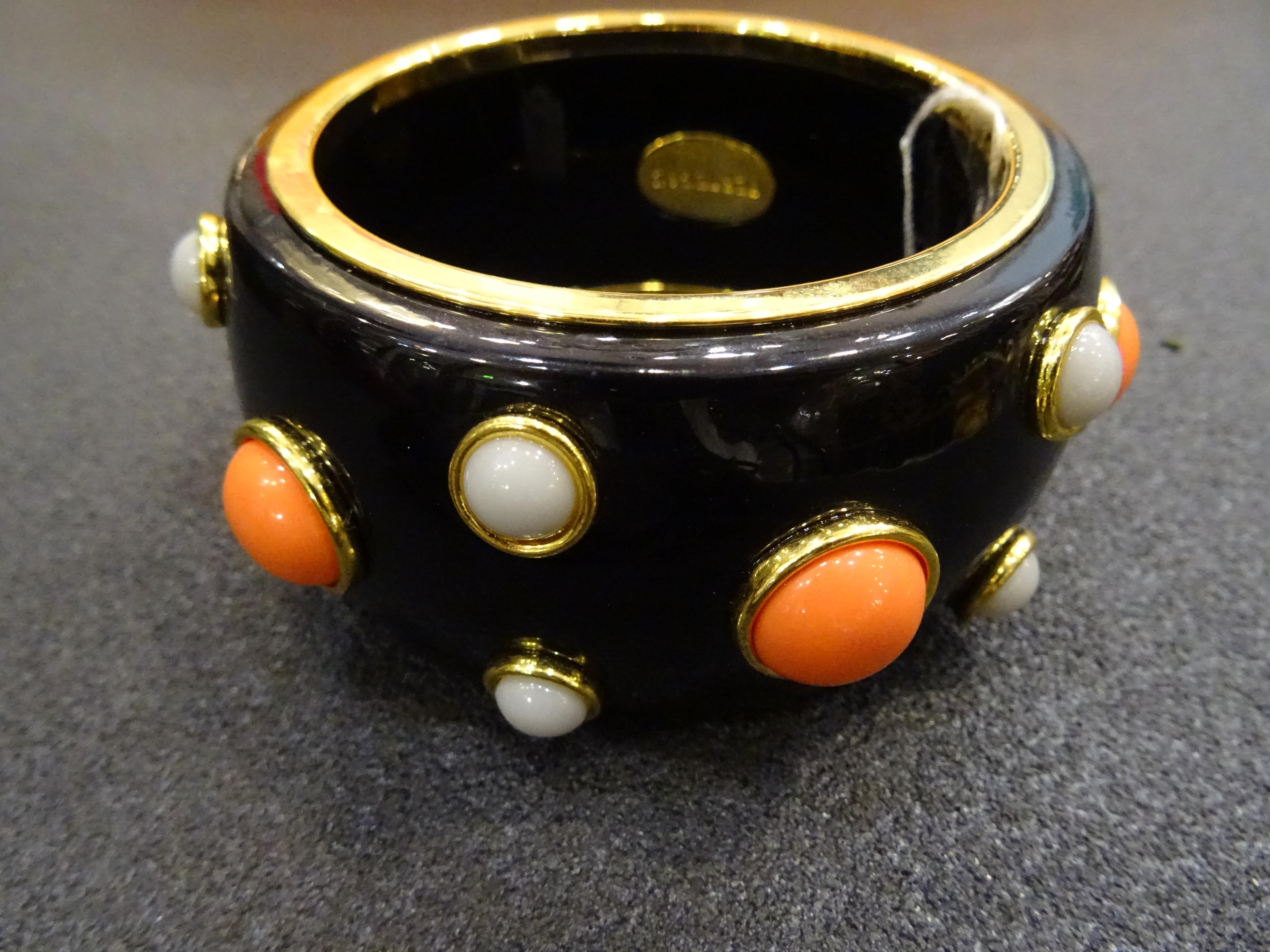 Amazing Pertegaz vintage black bakelite bracelet with faux white and orange stones.
Signed with a metallic label inside.
Pertegaz was a very renowned Spanish designer (1918-2014)
In a very good condition, not used and with his original fabric