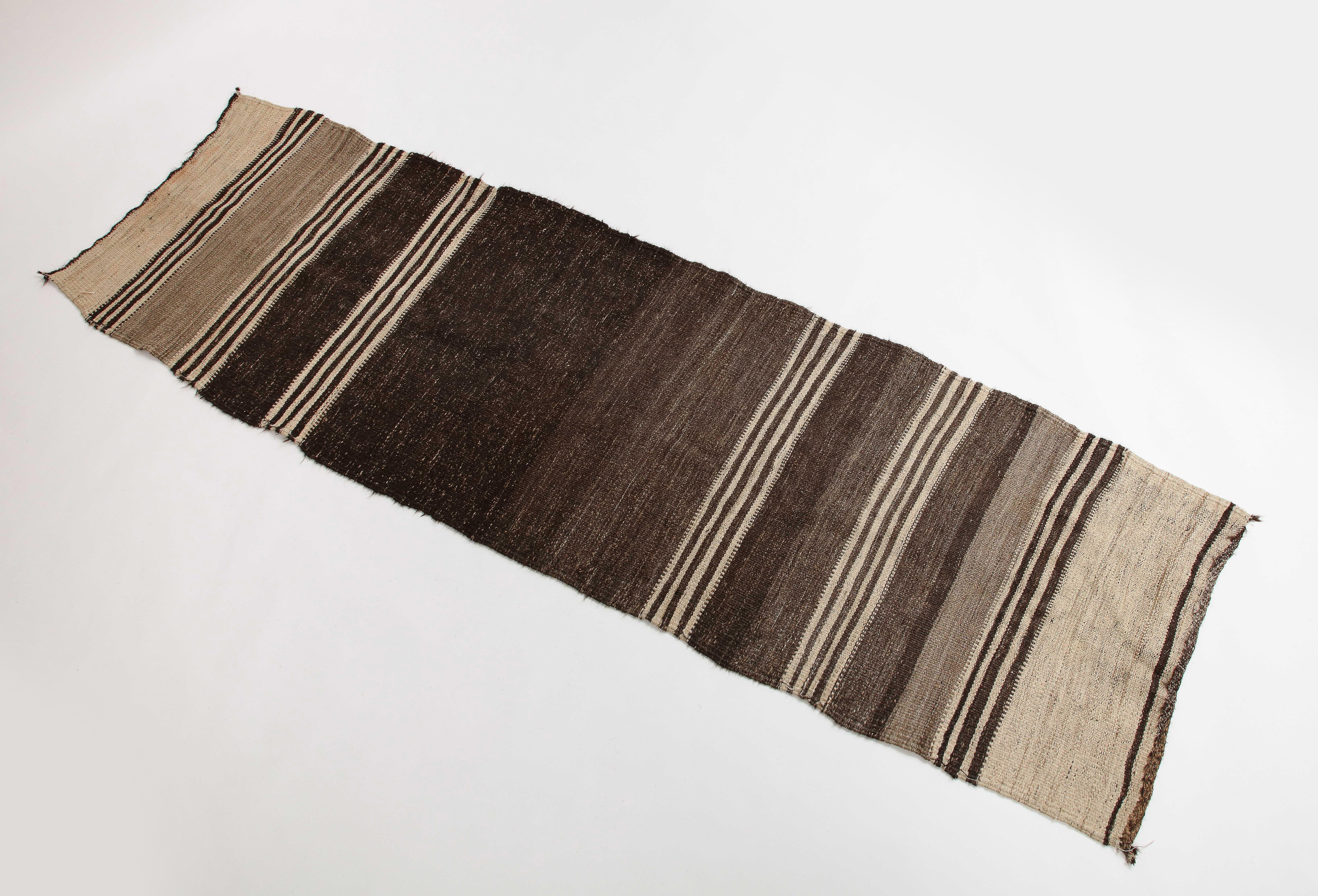 Peruvian hand-knotted wool runner with brown stripes.