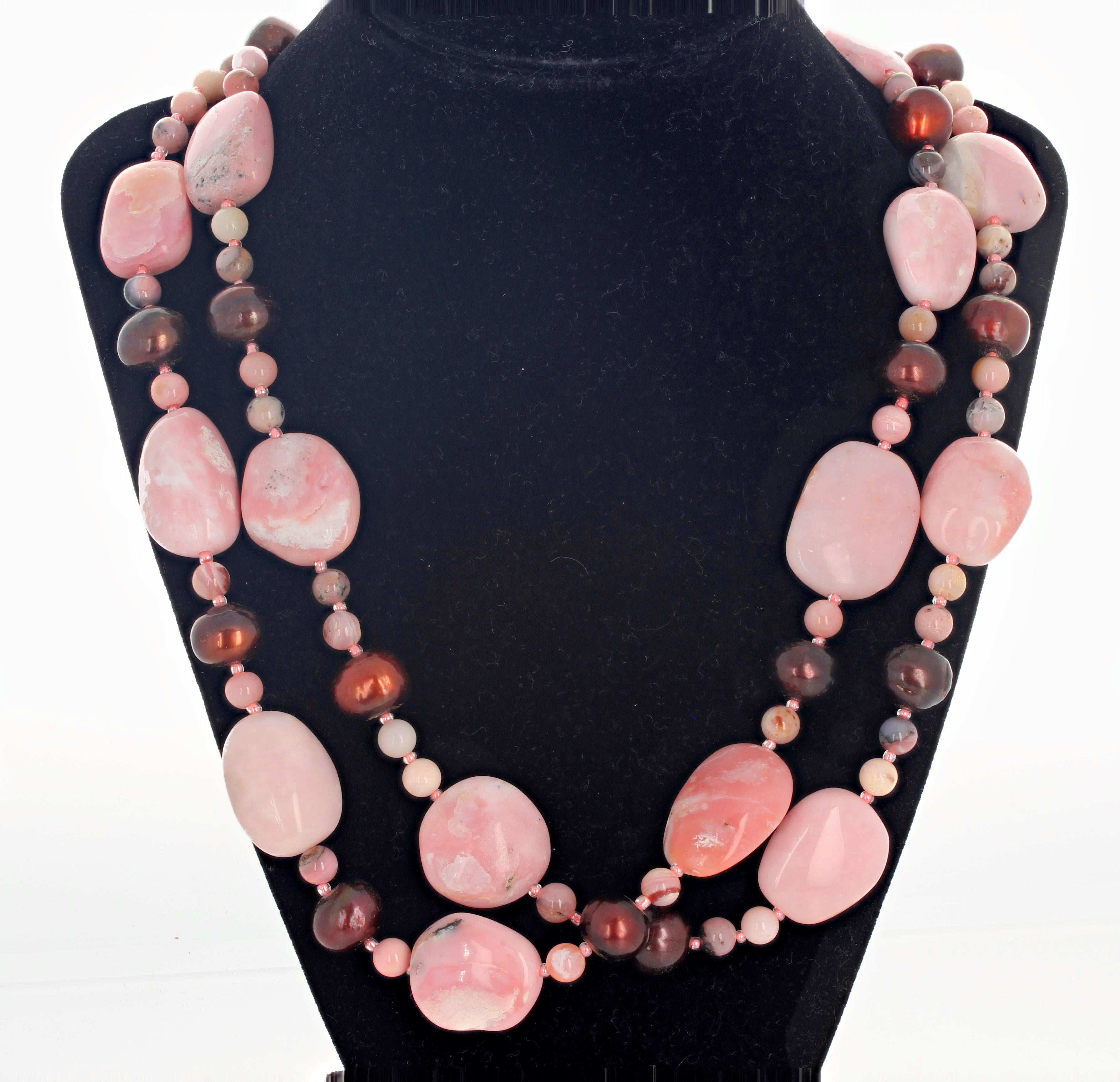 Double strand of highly polished glamorous RARE natural pink Peruvian Opals enhanced with coppery colored cultured Pearls set with a hook clasp - so easy to take on and off - in this 20.5 inch long necklace..  The largest Opal is 27 mm x 20.5 mm.  