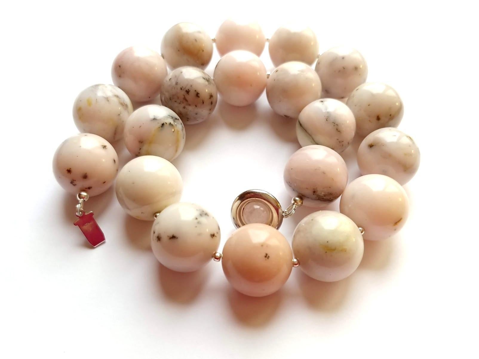 The length of the necklace is 18 inches (45.7 cm). The rare size of one bead is 20 mm.
Beads are a very gentle color, mixed with light pink, soft rose, and soft vanilla. There are also subtle black, white, and gray tones.
The color is authentic and