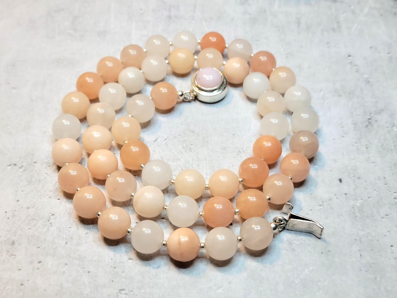 The length of the necklace is 24.5 inches (62 cm). The size of one bead is 10.5 mm.
Beads are a very gentle color mixed with light pink, soft rose, peach, and soft vanilla.
The color is authentic and natural. No thermal or other mechanical