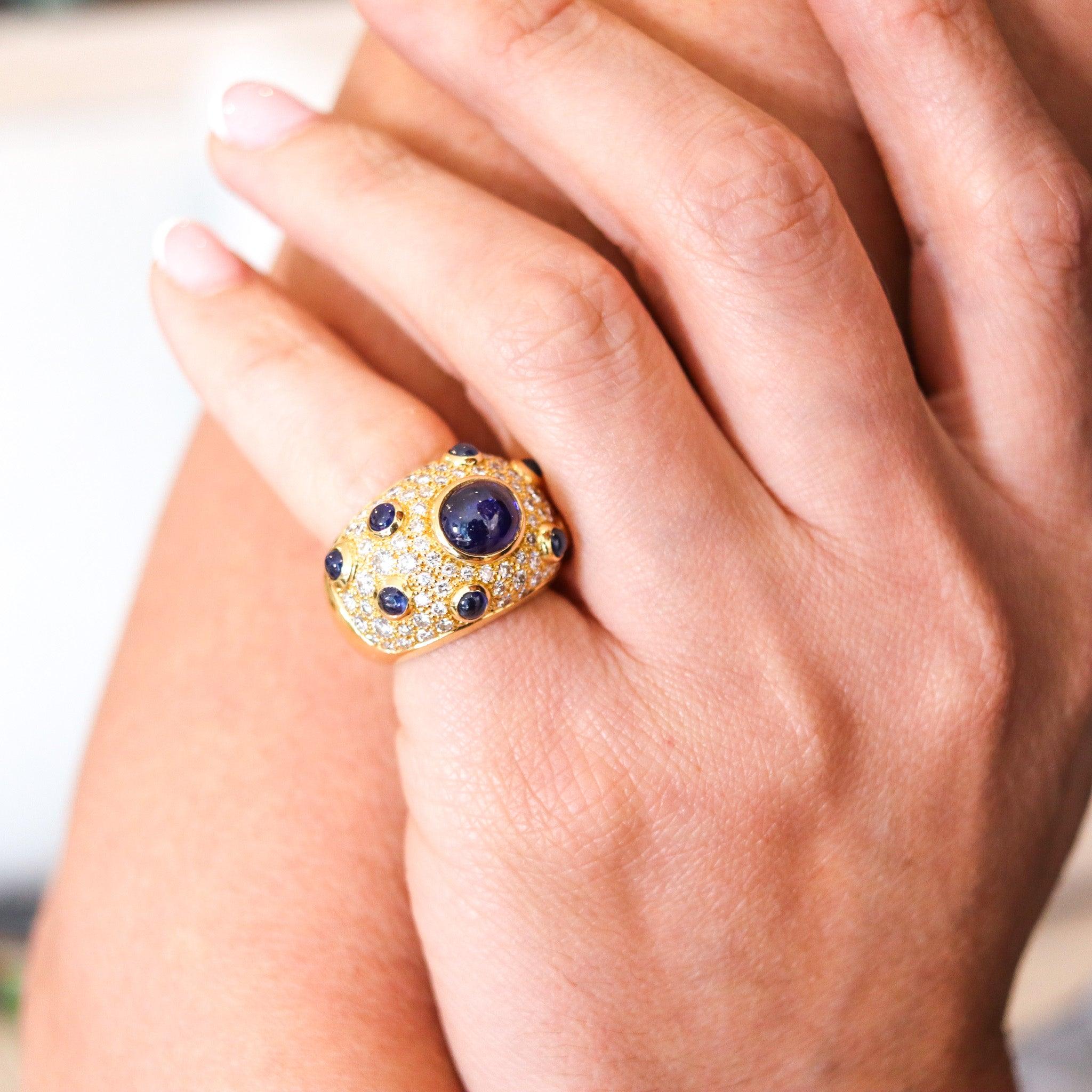 A French bombe cocktail ring with gemstones designed by Pery Et Fils

This is a very beautiful classic cocktail ring, created in Paris France, back in the late 20th century. The ring has been crafted at the Pery Et Fils company, as dome in solid