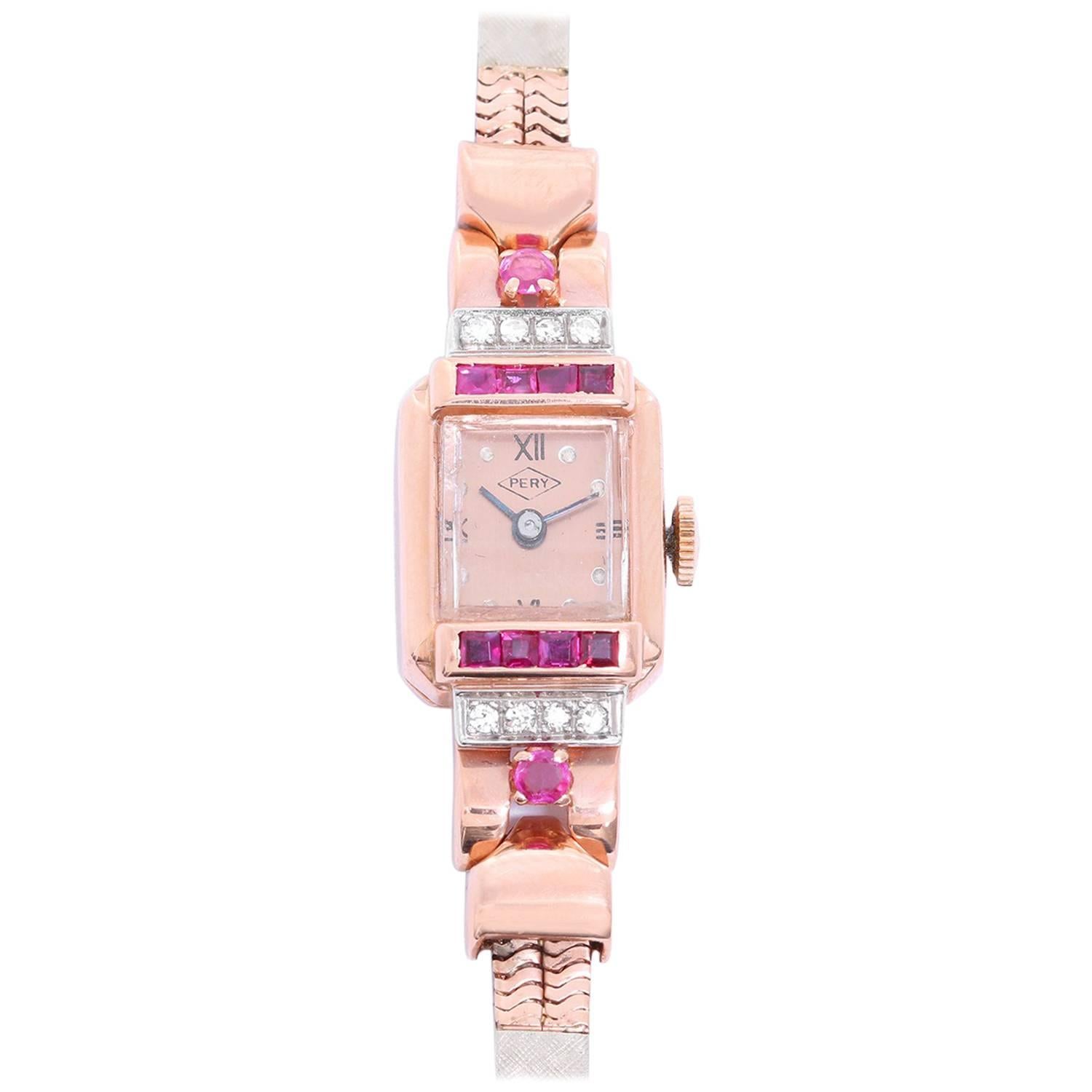 Montre-bracelet manuelle vintage Pery pour femme en or rose, diamants et rubis en vente