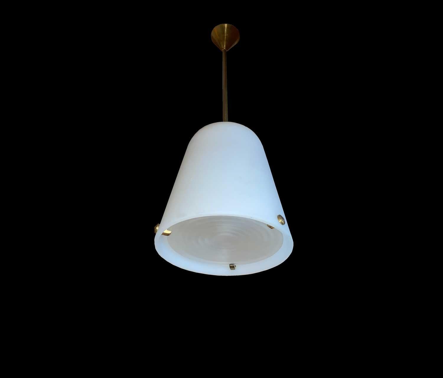 Jean Perzel 
Acid satin enameled glass ceiling light is decorated with three bronze claws on which rests a prismatic glass lens with an adjustable beam amplifying its power. Edition from the 1950s Model no longer published today in this