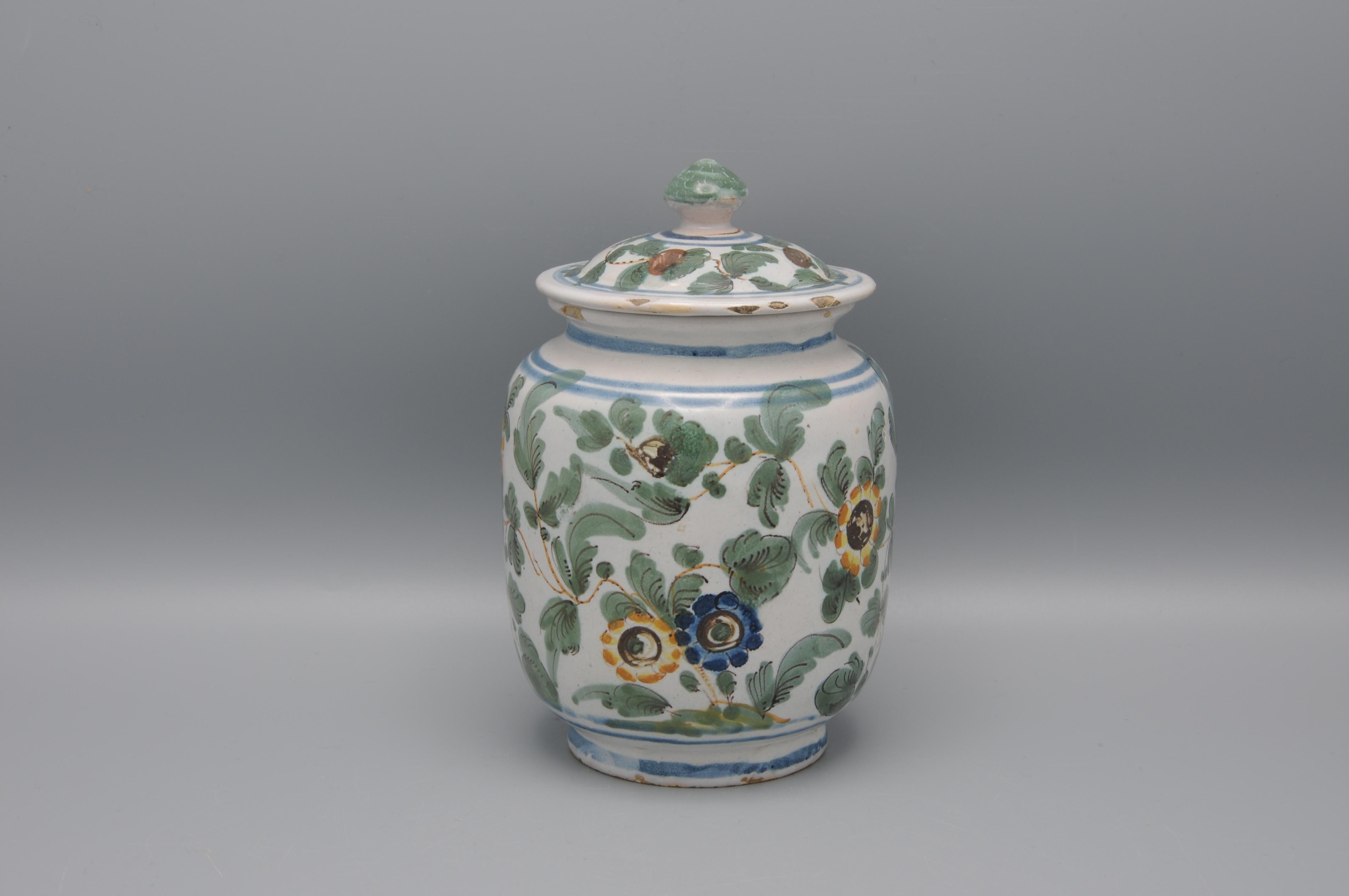 Albarello wand cover with polychrome decoration called “al tacchiolo” of foliage with stylized flowers.
Marked under the base: “N° 49