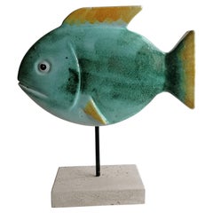 Fish carved on volcanic stone , enameled and decorated-made in Italy