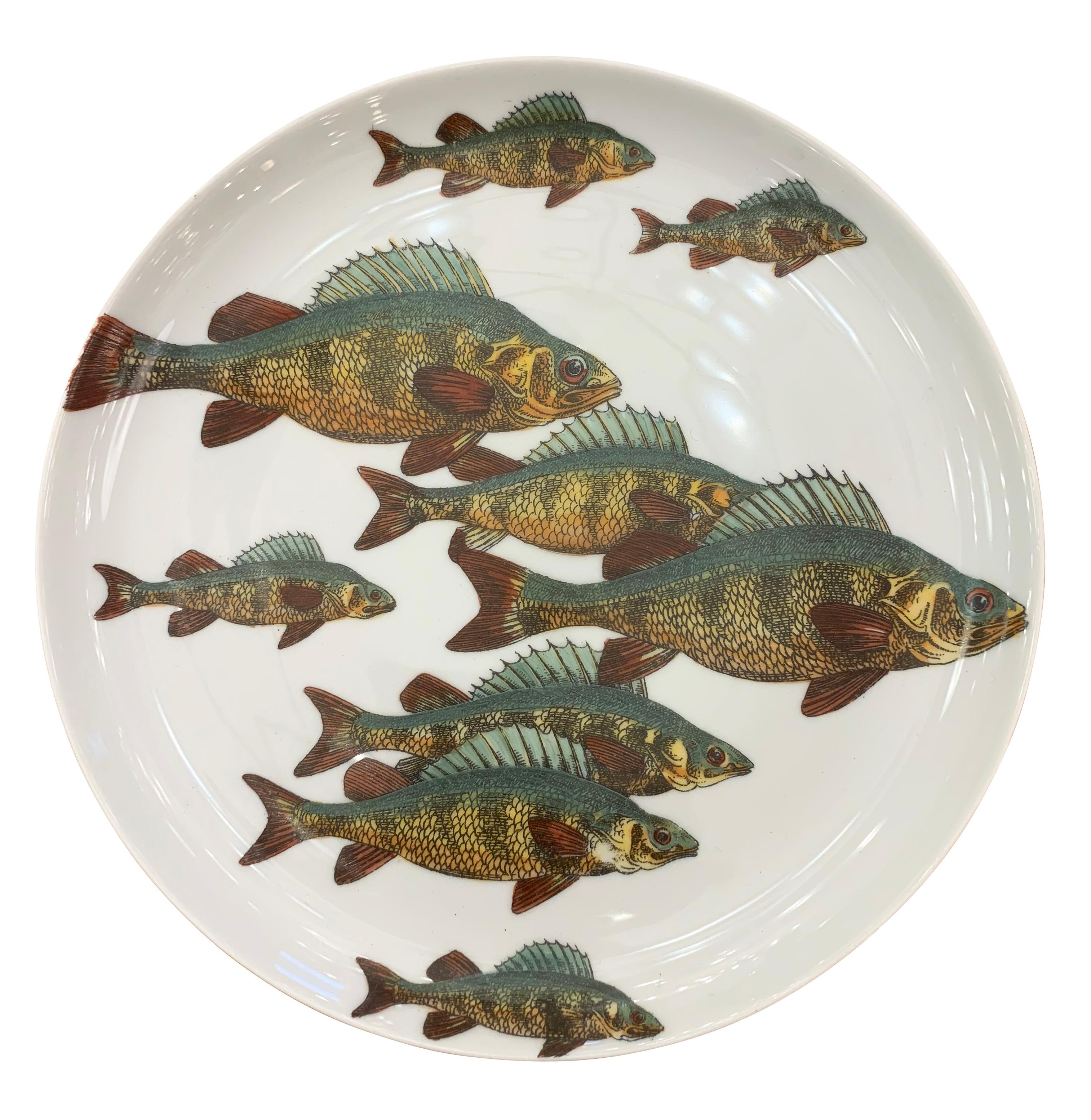 1960s Piero Fornasetti plates depicting fish. Sold individually, price per plate.

Condition: Excellent vintage condition, minor wear consistent with age and use.

Diameter: 10”.