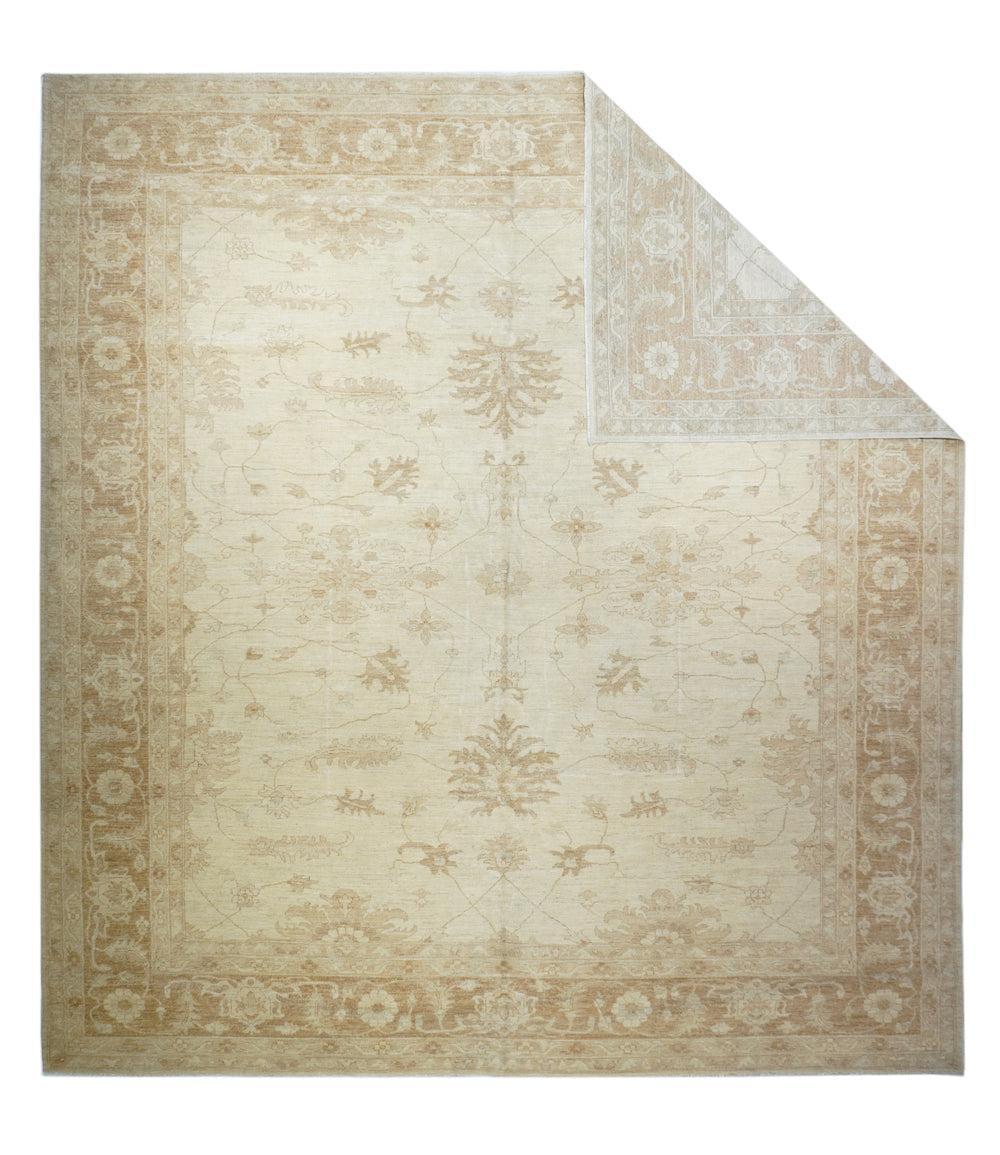 Peshawar Rug 11'2'' x 12'7''. Two large, emphatically ragged palmettes face off on the straw-cream field with wiry vines and a scattering of small, similar palmettes. Half palmettes edge in on all four sides. Light brown border with serrated