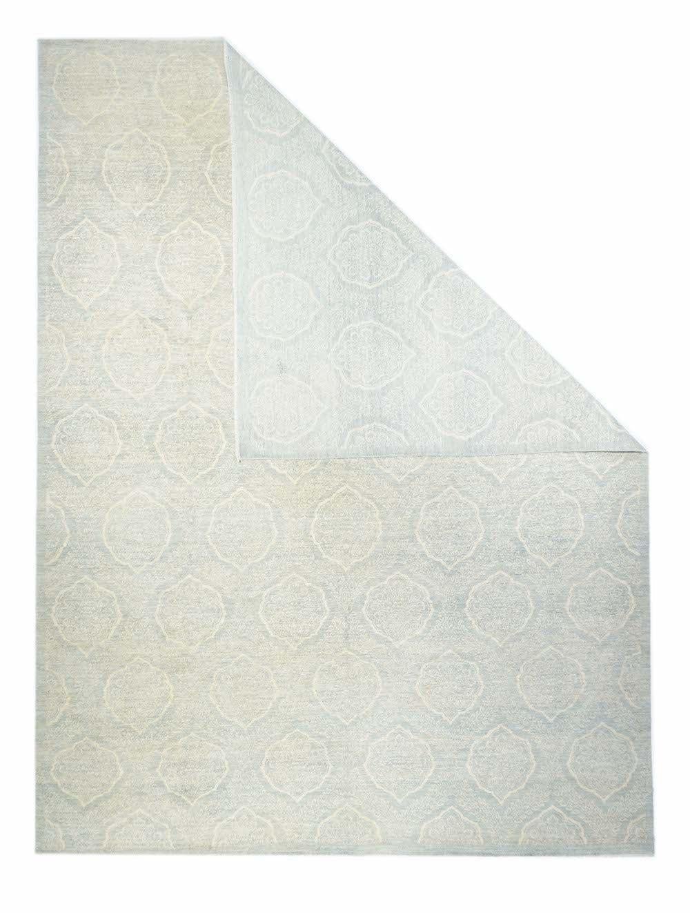Peshawar Rug 8'11'' x 12'0''. Peshawar has emerged in recent years as a centre of Pakistani weaving specializing in urban, Persianate styles. This is a more abstract, borderless example with faceted and pointed ellipses, on an abrashed light ground,