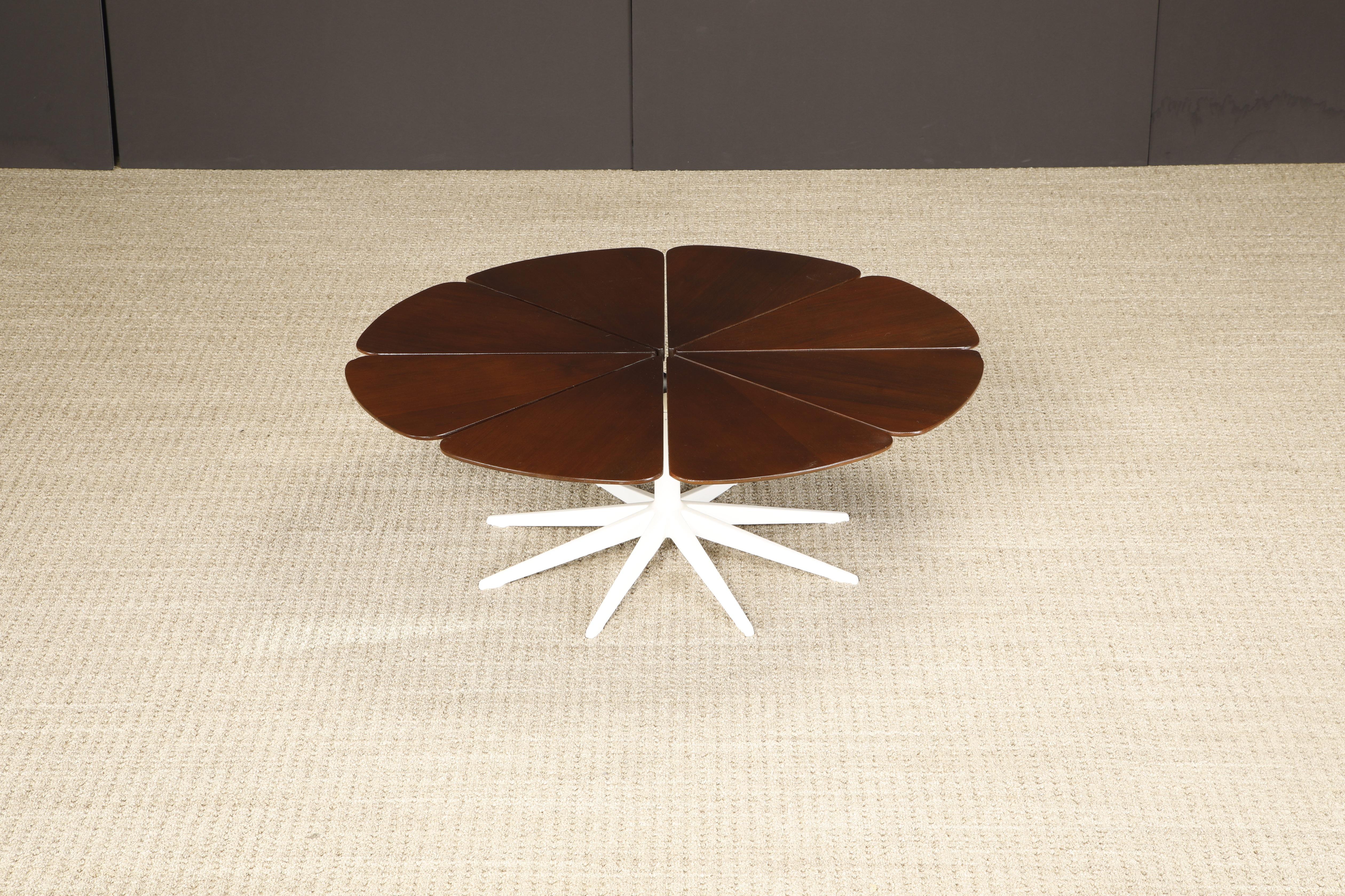 This 1st Generation original of the 'Petal' coffee table with Redwood 'petals' by Richard Schultz for Knoll Associates, designed in 1960, is a favorite amongst Mid-Century Modern collectors and enthusiasts. This example is signed with a Knoll