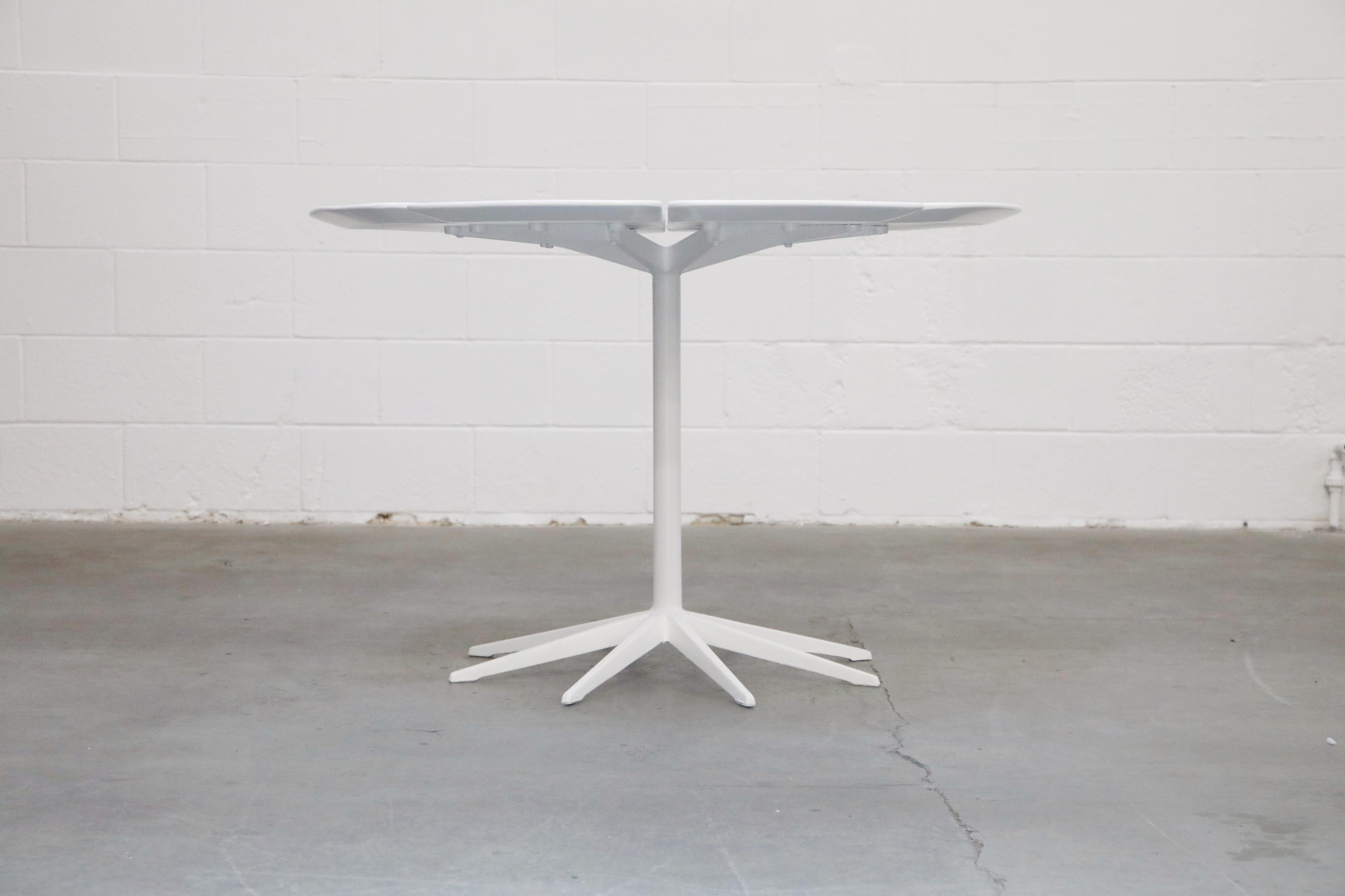 This early production 'Petal' dining table by Richard Schultz for Knoll International, signed with label underneath, has been restored and is in beautiful refinished condition, ready for immediate use. Designed in 1960, this example produced in