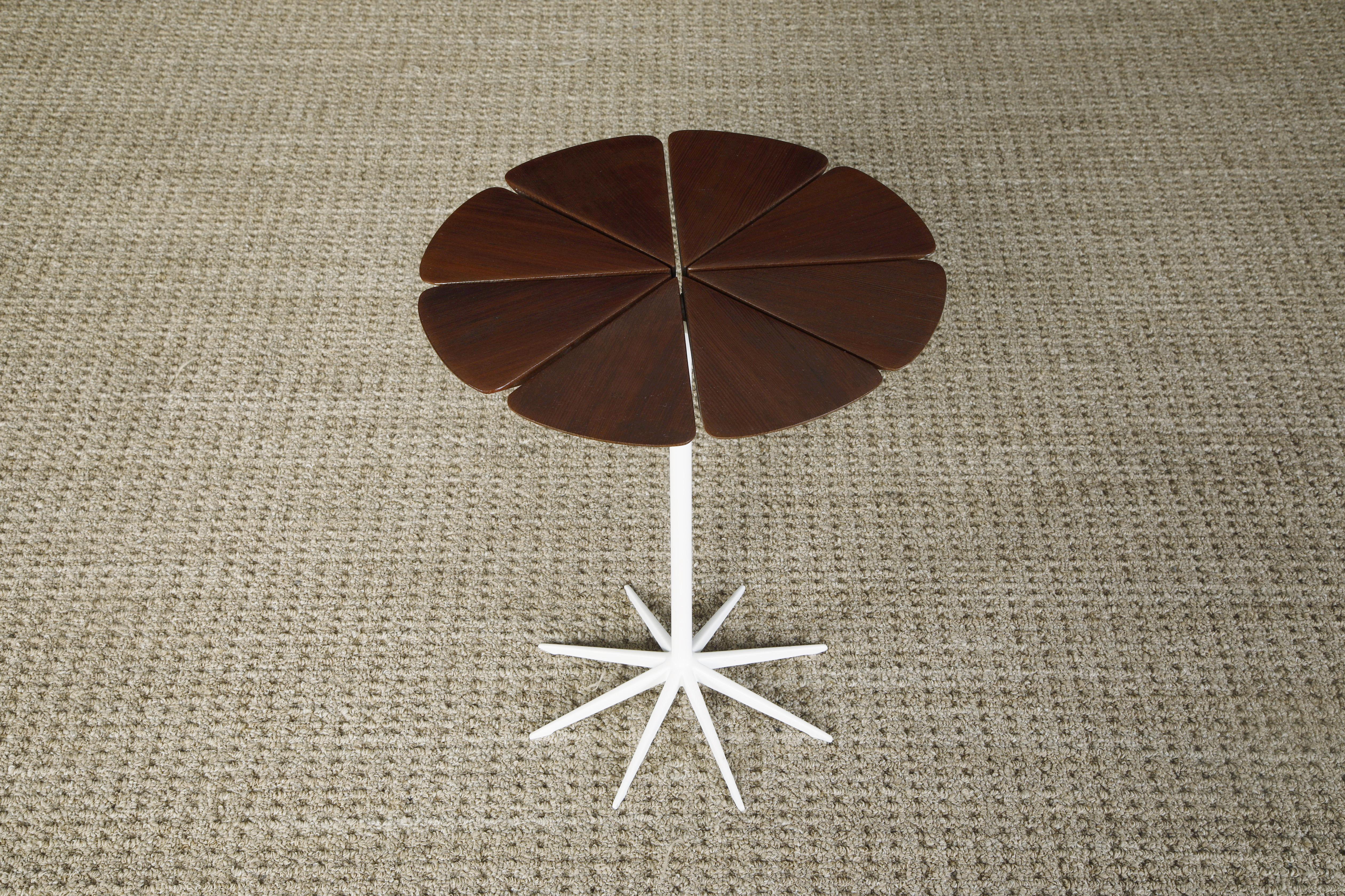 This signed early production 'Petal' drinks table by Richard Schultz for Knoll Associates, designed in 1960, is a favorite amongst Mid-Century Modern collectors and enthusiasts. This side table was refinished and features eight petal sections made