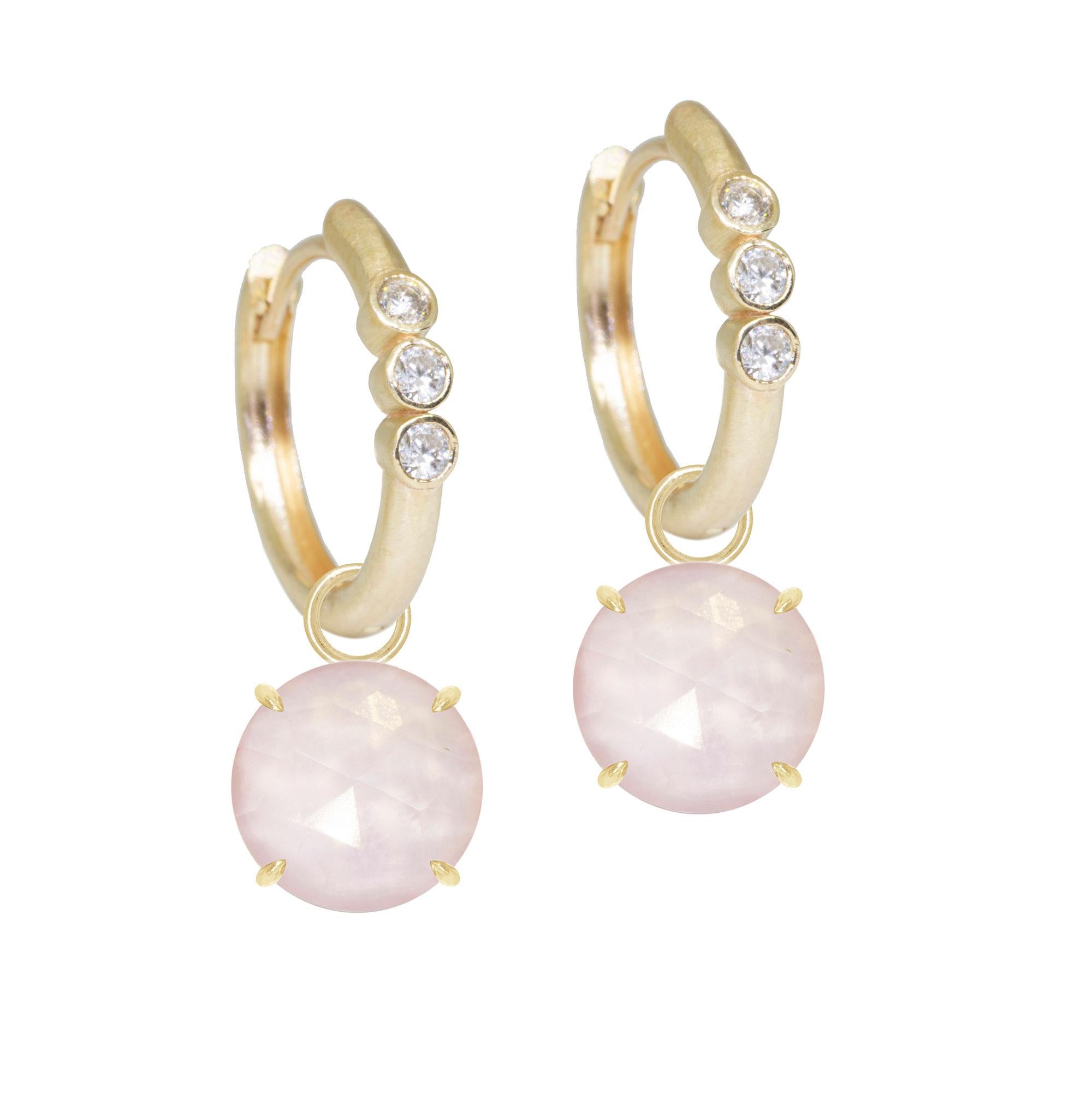 A natural complement to your personal style: Made with faceted rose quartz, these sweet, simple prong-set Petal Gold Charms add extra shimmer to any of our hoops.

Nina Wynn Design's patent-pending earrings have an element on the back of the stud or